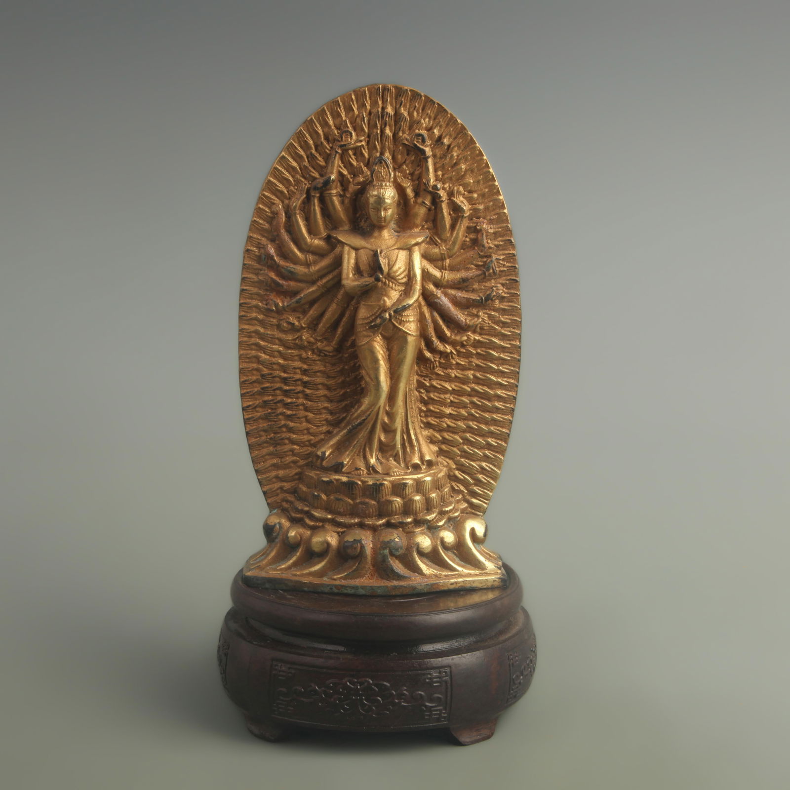 GILT BRONZE THOUSAND-ARMED AVALOKITESHVARA STATUES: 20th Century; High: 7.00 inch; Width: 1.60 inch; Long: 3.80 inch;