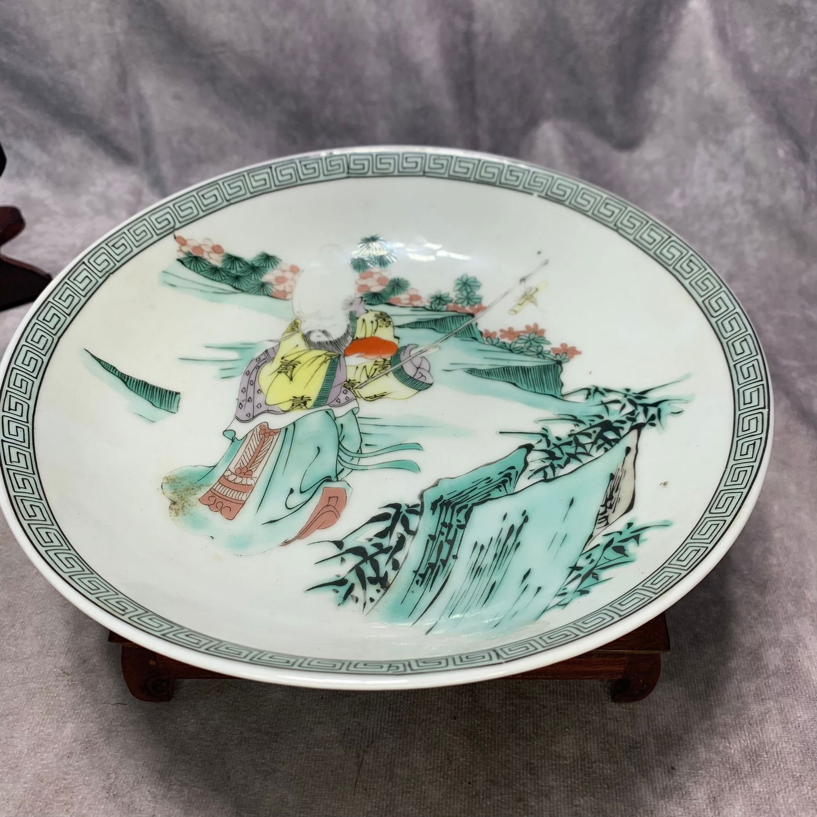 QIANLONG MARK FAMILLE ROSE DRAGON AND PHOENIX CHARACTER PLATE: Qing Dynasty; High: 1.7 inch; Diameter: 8.8 inch;
