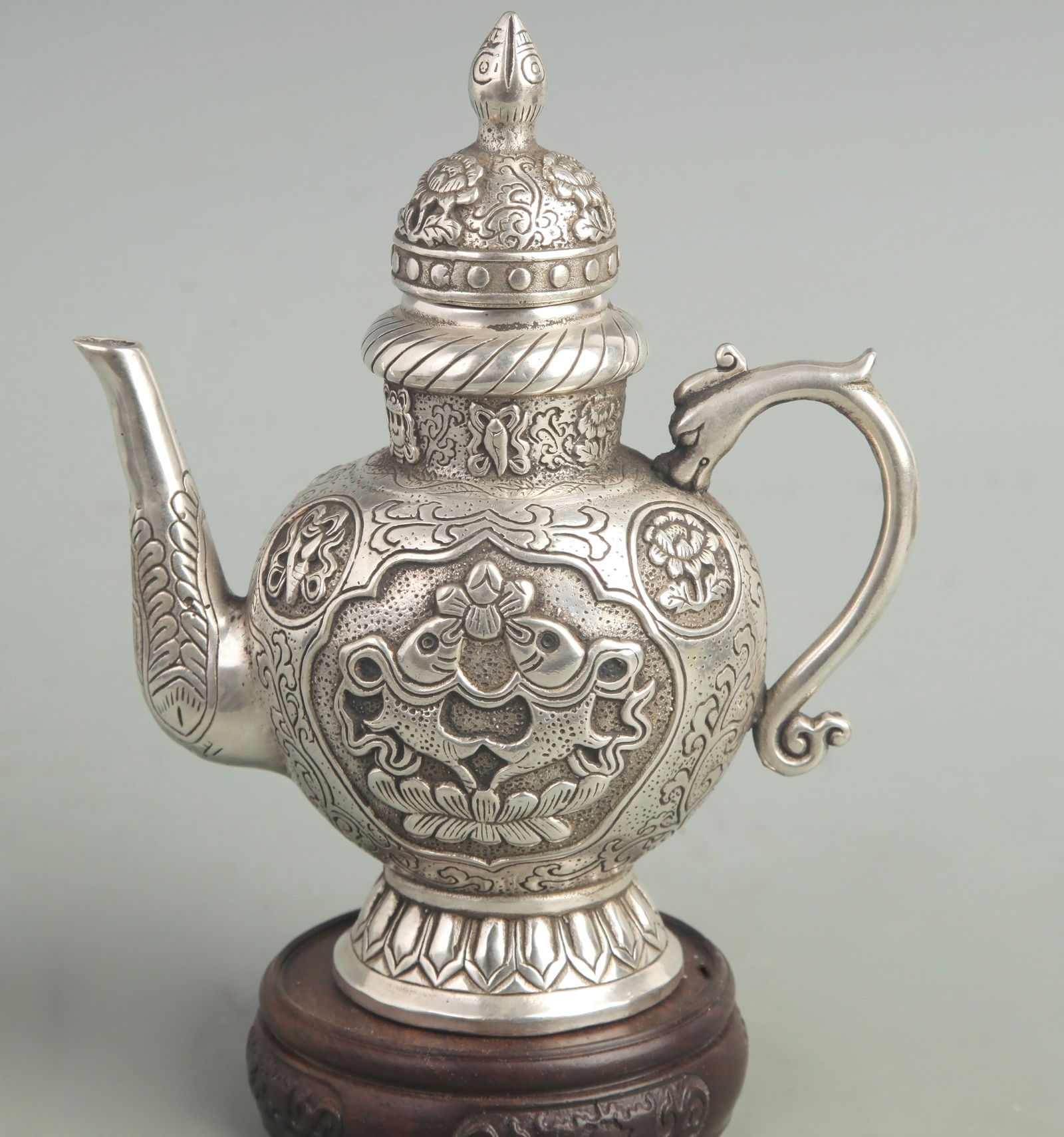 A FINELY CARVED TIBETAN PATTERN WHITE BRONZE EWER (1 of 6)