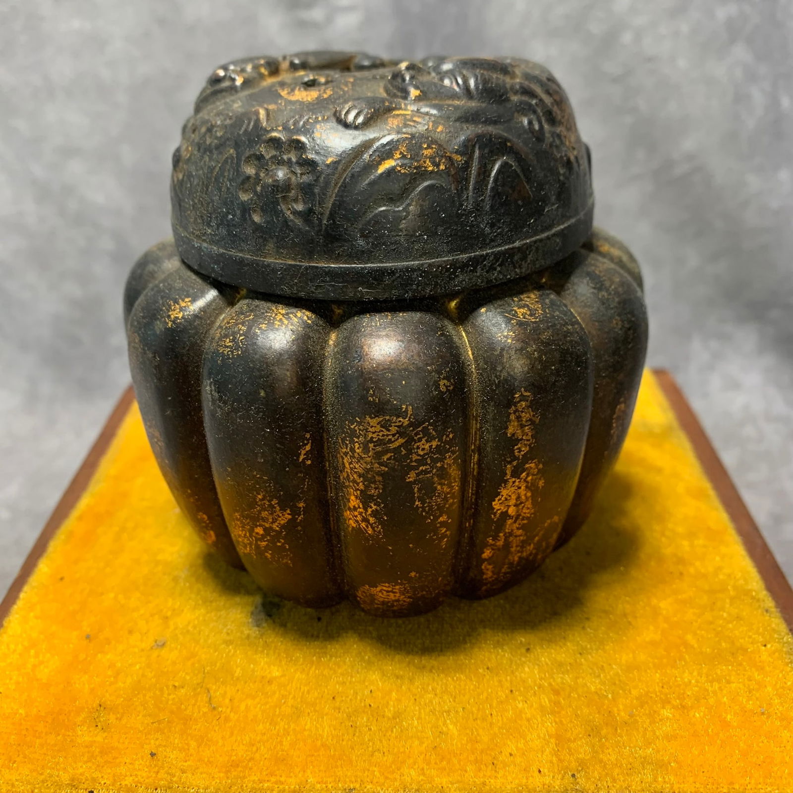 XUAN MARK MELON-SHAPED INCENSE BURNER WITH LION MOTIFS: Ming Dynasty; High: 3.6 inch; Diameter: 3.9 inch;