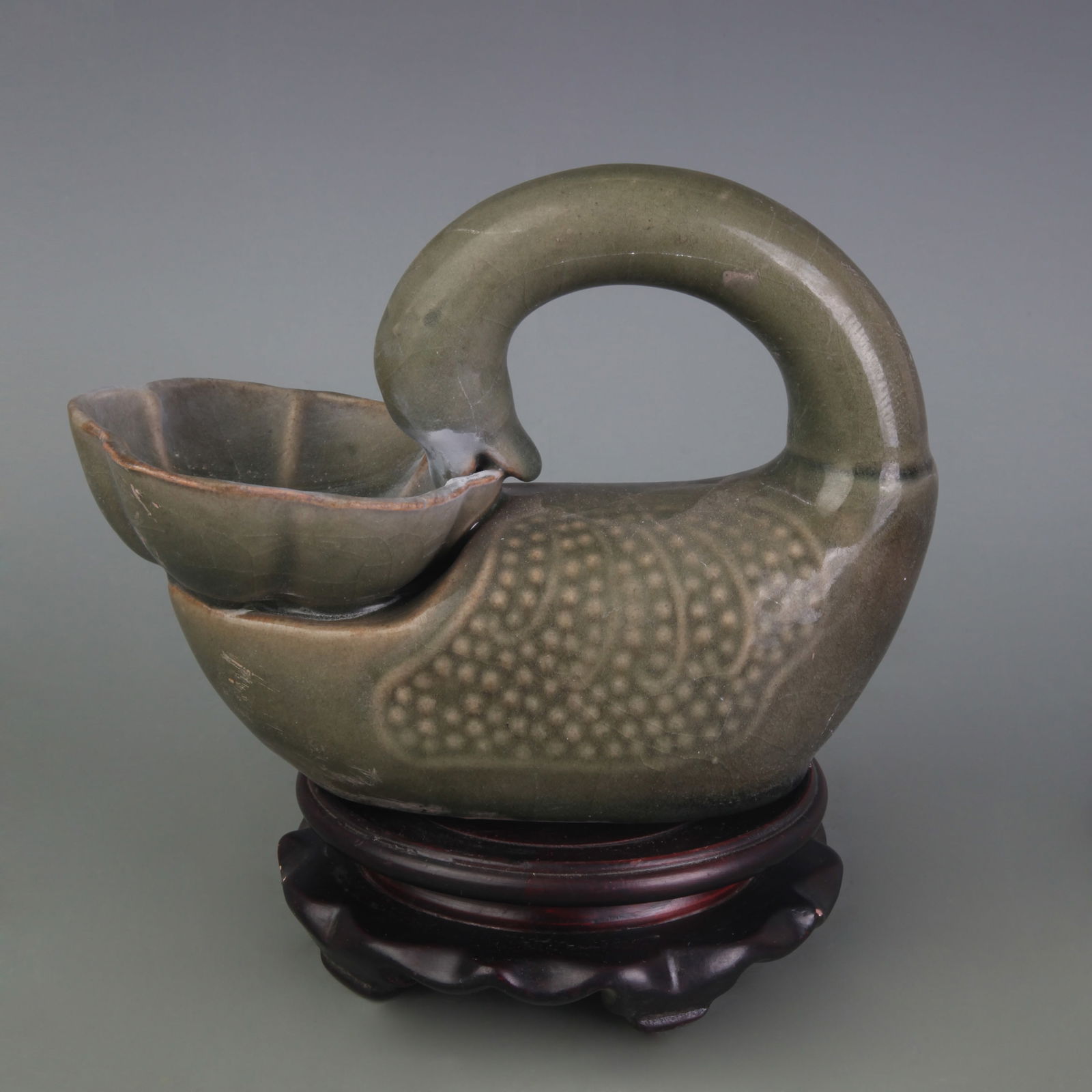 A FINE CELADON COLOR GLAZED PORCELAIN CANDLESTICK (1 of 5)