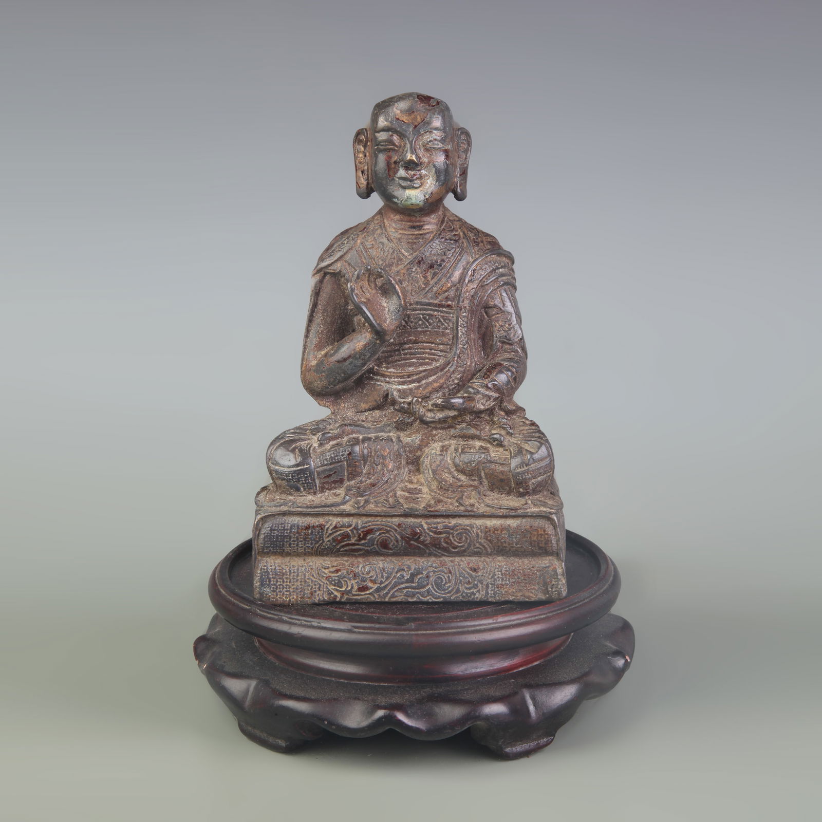 A FINE GILT-BRONZE ARHAT STATUE (1 of 6)