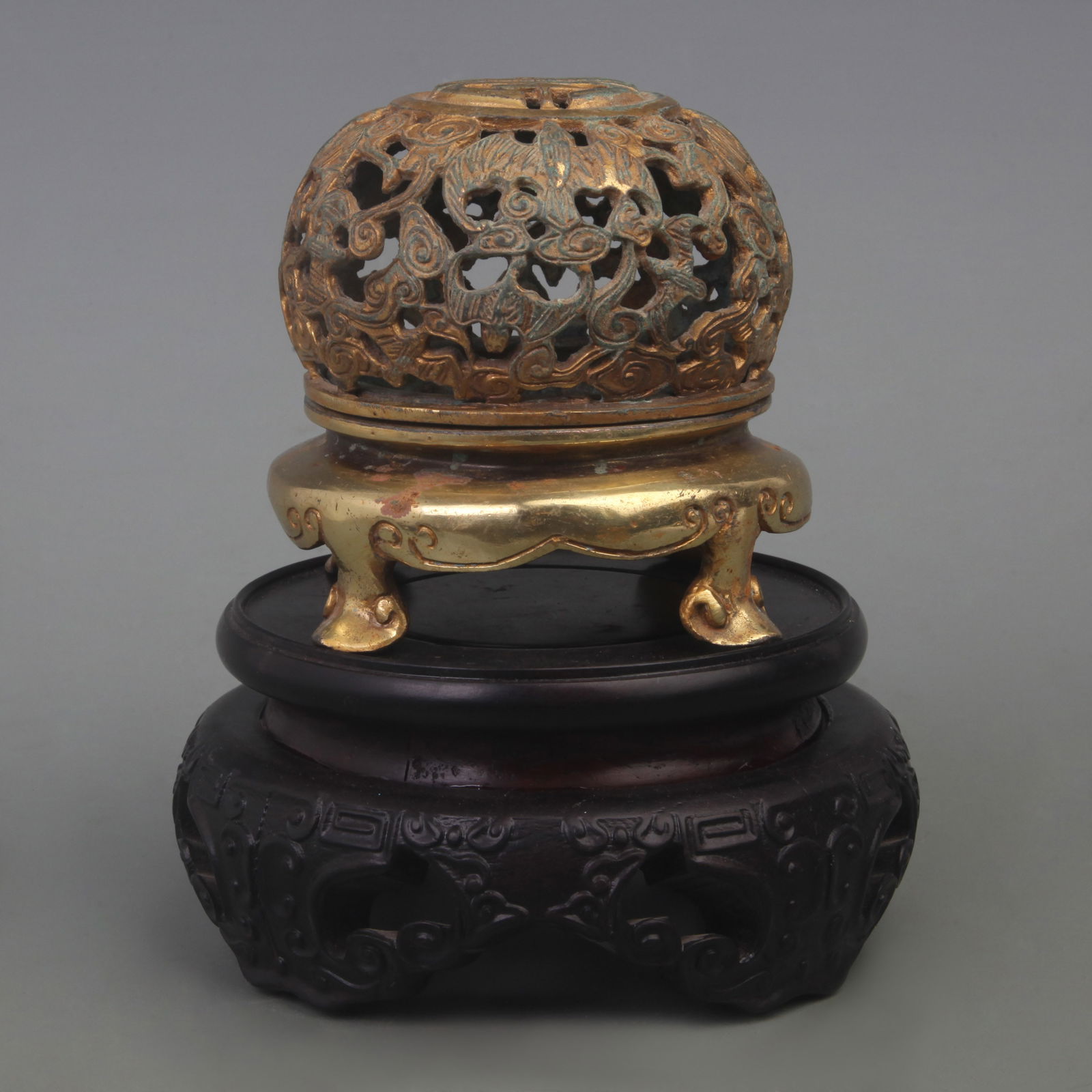 A BRONZE AUSPICIOUS PATTERN FOUR-LEGGED INCENSE BURNER (1 of 3)