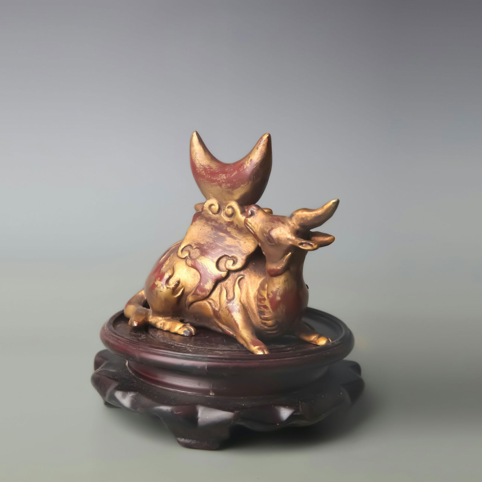GILT BRONZE RHINOCEROS AND MOON CALLIGRAPHY BRUSH REST: Qing Dynasty; Long: 4.5 inch; High: 3.9 inch;