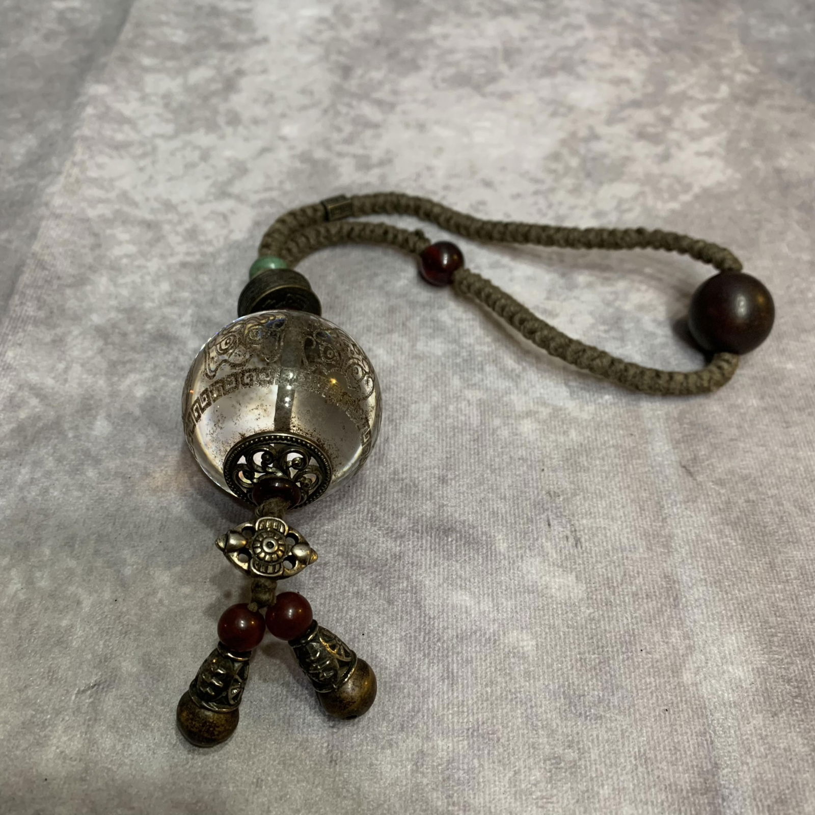 A FINE GLASS CARVING PENDANT: Modern; Long: 13.0 inch; Diameter: 1.9 inch;