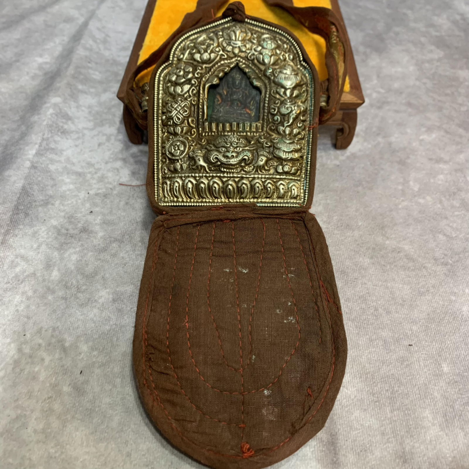 A FINE TIBETAN BUDDHIST GAU PENDANT (1 of 4)