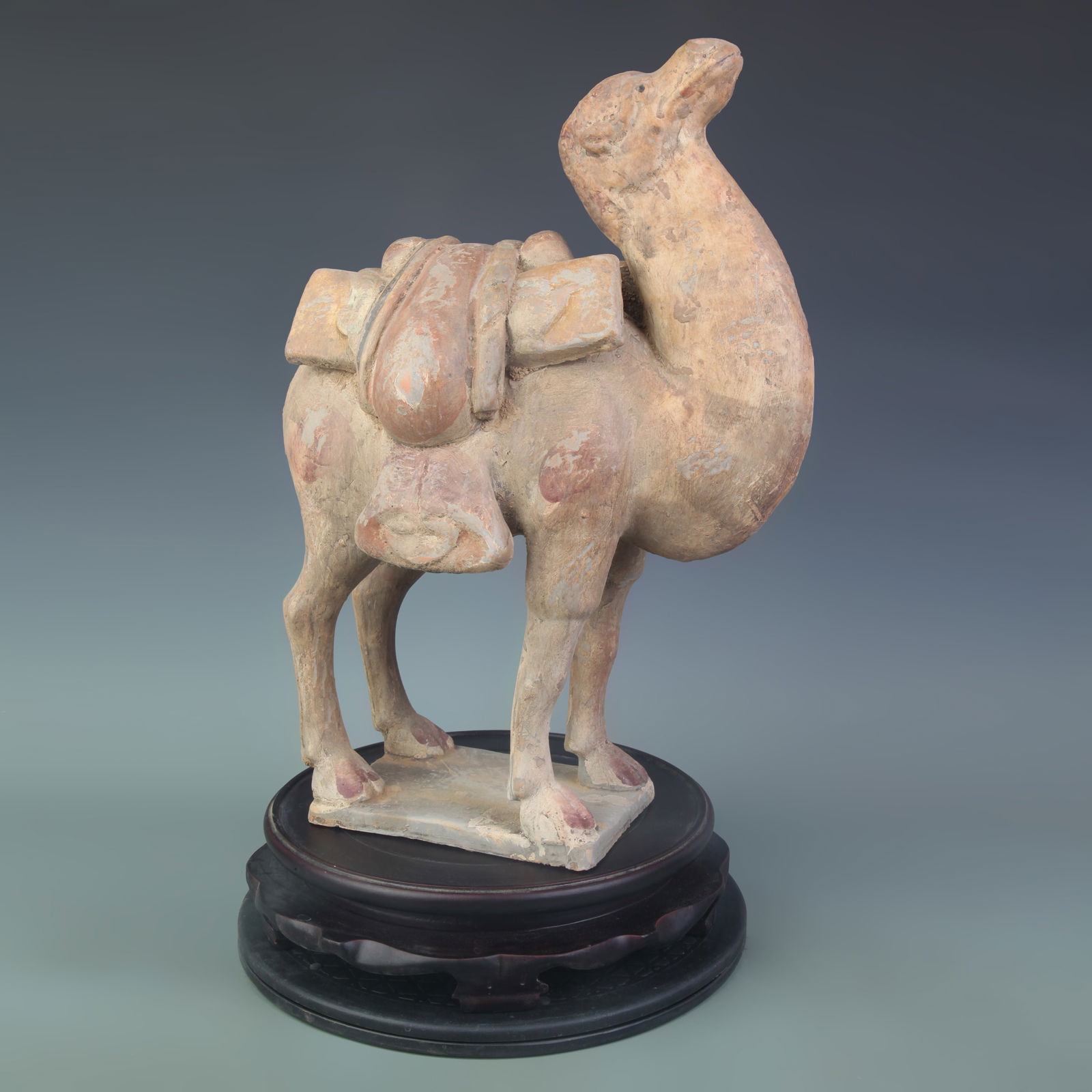 A FINE PAINTED POTTERY CAMEL FIGURE (1 of 5)