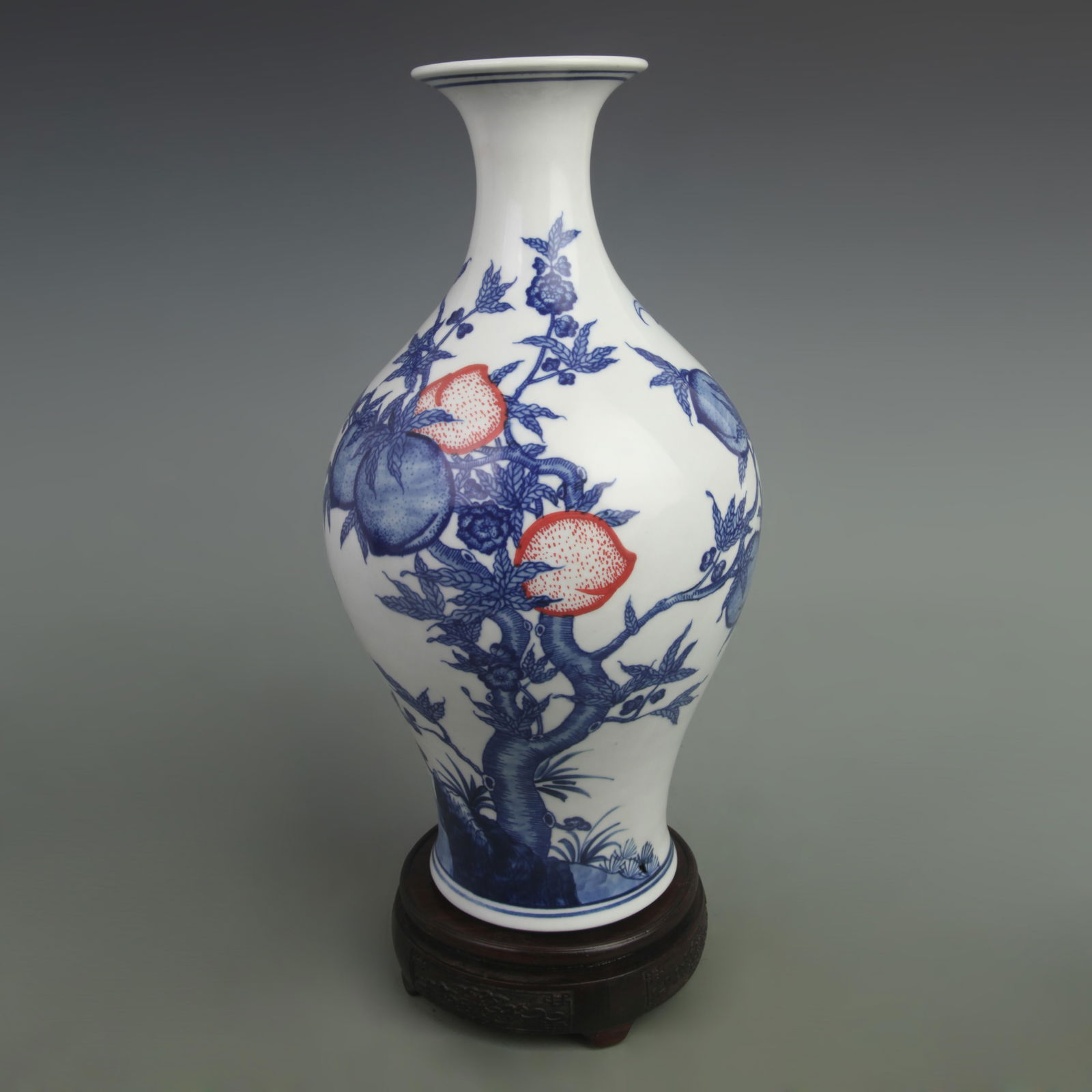 BLUE AND WHITE YOU LI HONG GLAZED OLIVE SHAPED PORCELAIN VASE: Qing Dynasty Yong Zheng Period; High: 13.5 inch; Width: 8 inch;