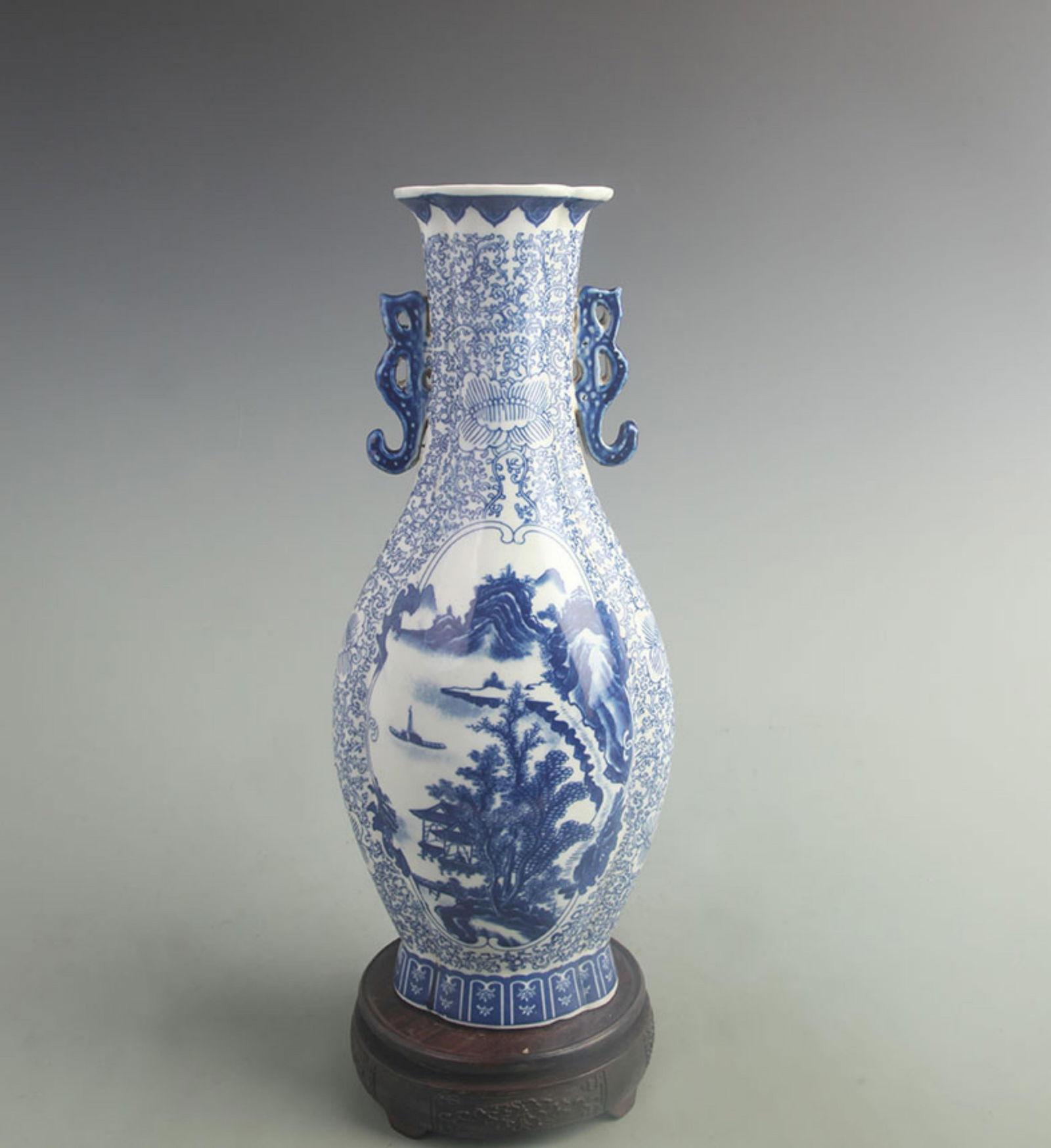 BLUE AND WHITE FLOWER PATTERN DOUBLE EAR PORCELAIN VASE: Qing Dynasty Qian Long Period; High: 14.0 inch; Width: 5.70 inch;