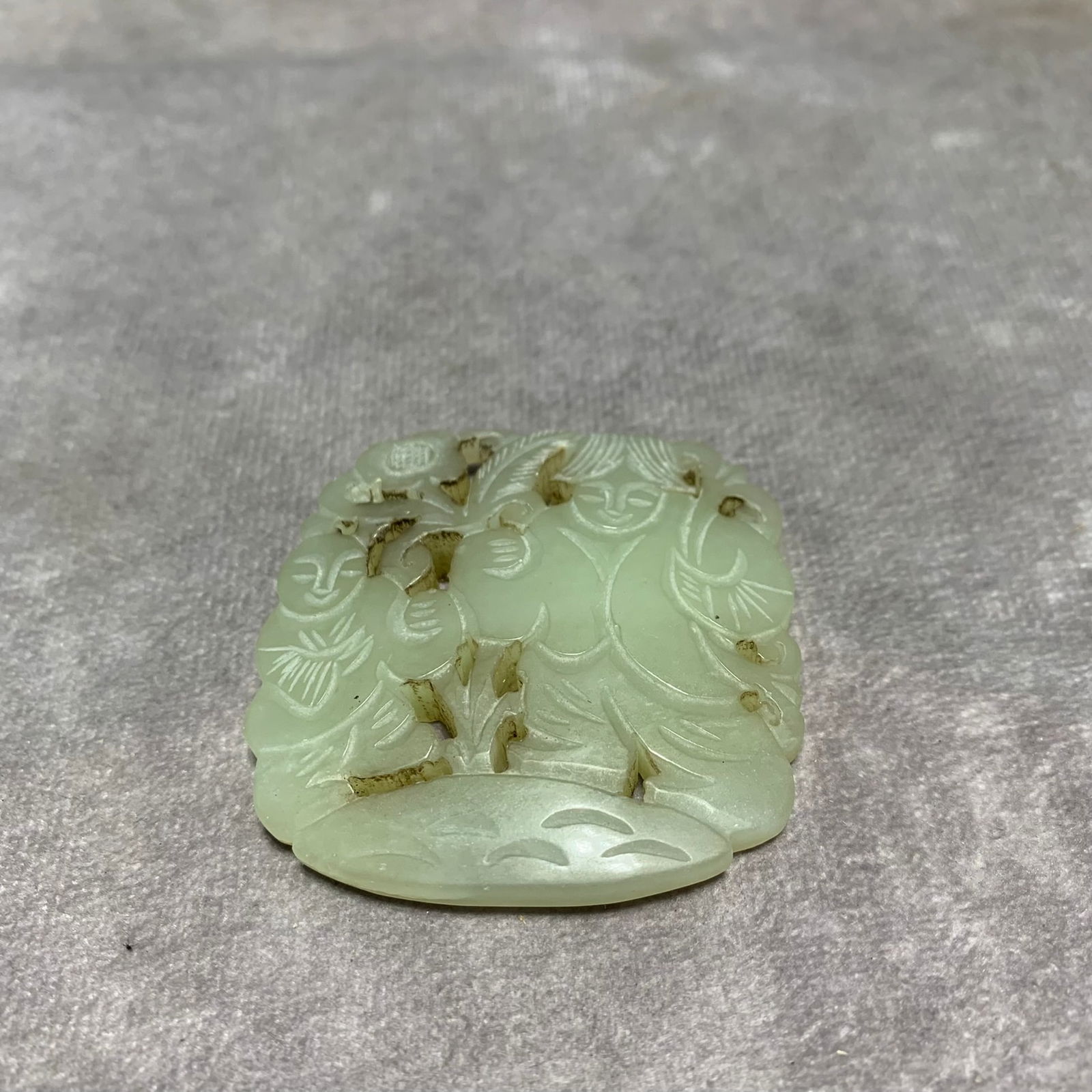 HETIAN GREENISH-WHITE JADE PENDANT WITH FIGURE DESIGN: Qing Dynasty; Long: 2 inch; Width: 2 inch; High: 0.3 inch;