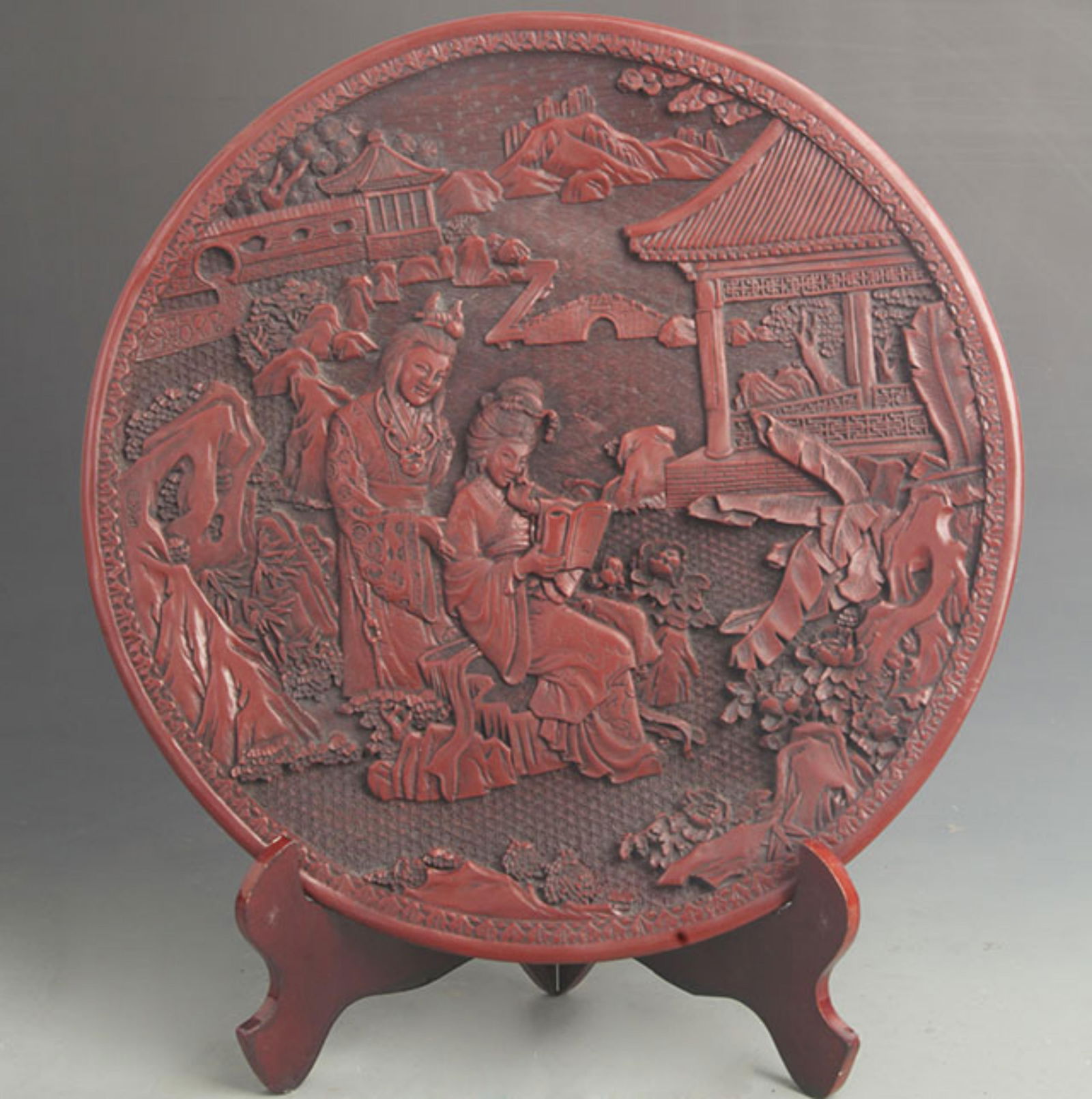 A FINE CARVED LACQUERER STORY PATTERN PLATE (1 of 4)