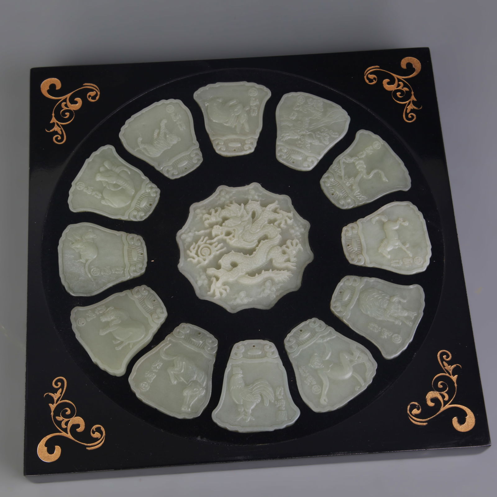 SET OF HE TIAN JADE CARVED TWELVE ZODIAC PENDANTS: Modern: Width: 1.7 inch; Long: 2.0 inch