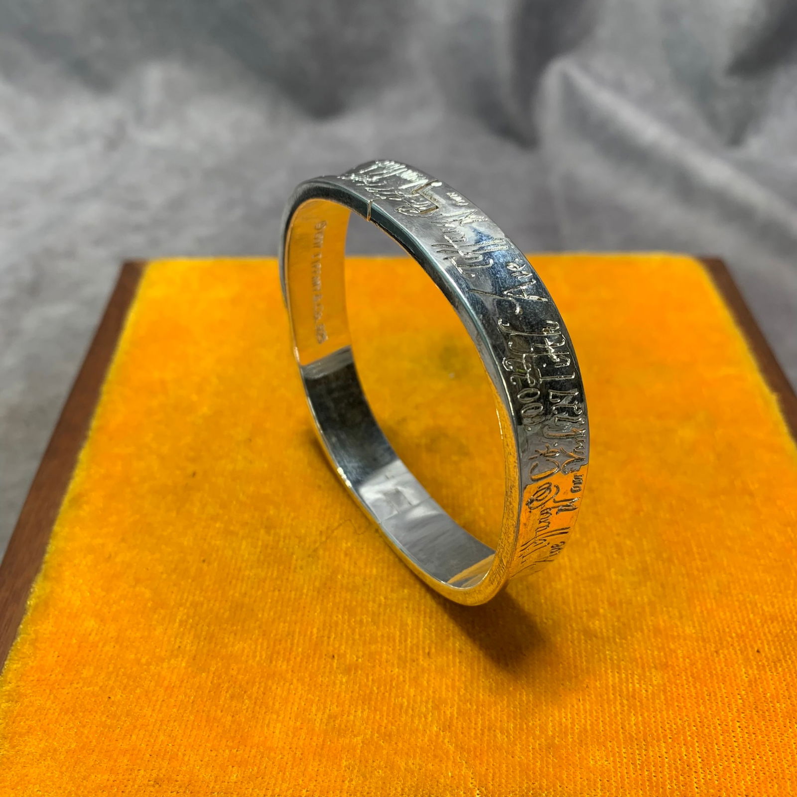 A FINE SILVER PLATED BANGLE: Modern; Diameter: 0.4 inch;