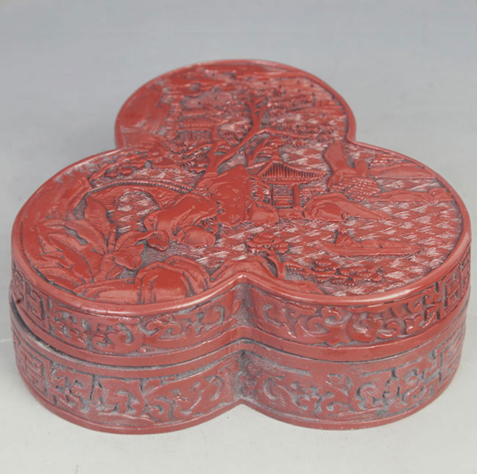 A FINE RED CARVED LACQUER CHARACTER PATTERN BOX (1 of 5)
