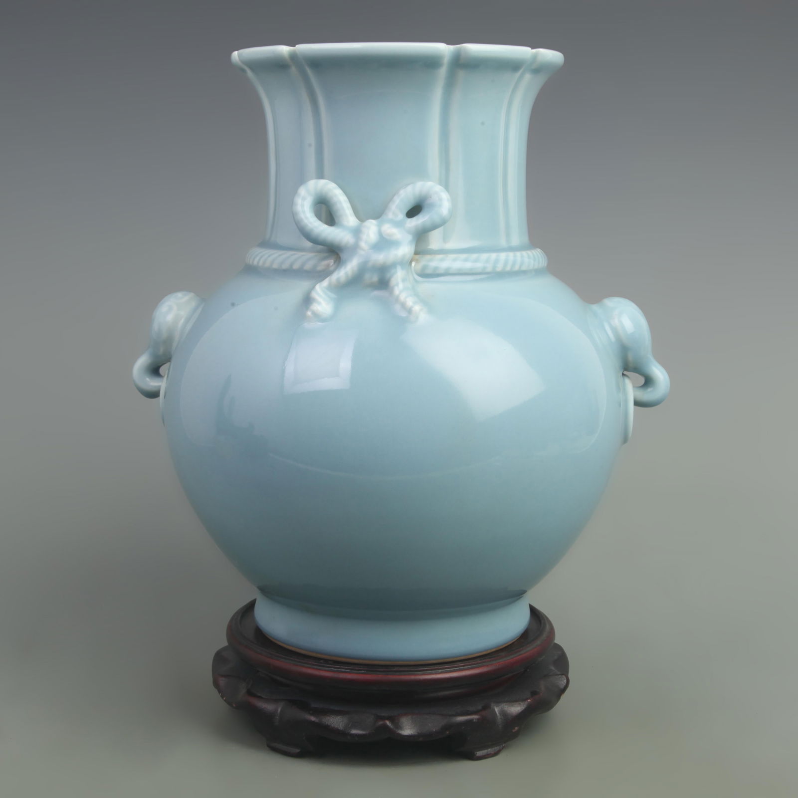 POWDER BLUE GLAZED VASE WITH BUTTERFLY KNOTS, ELEPHANT TRUNK HANDLES: Qing Dynasty Qian Long Period; High: 10.8 inch; Width: 12 inch;