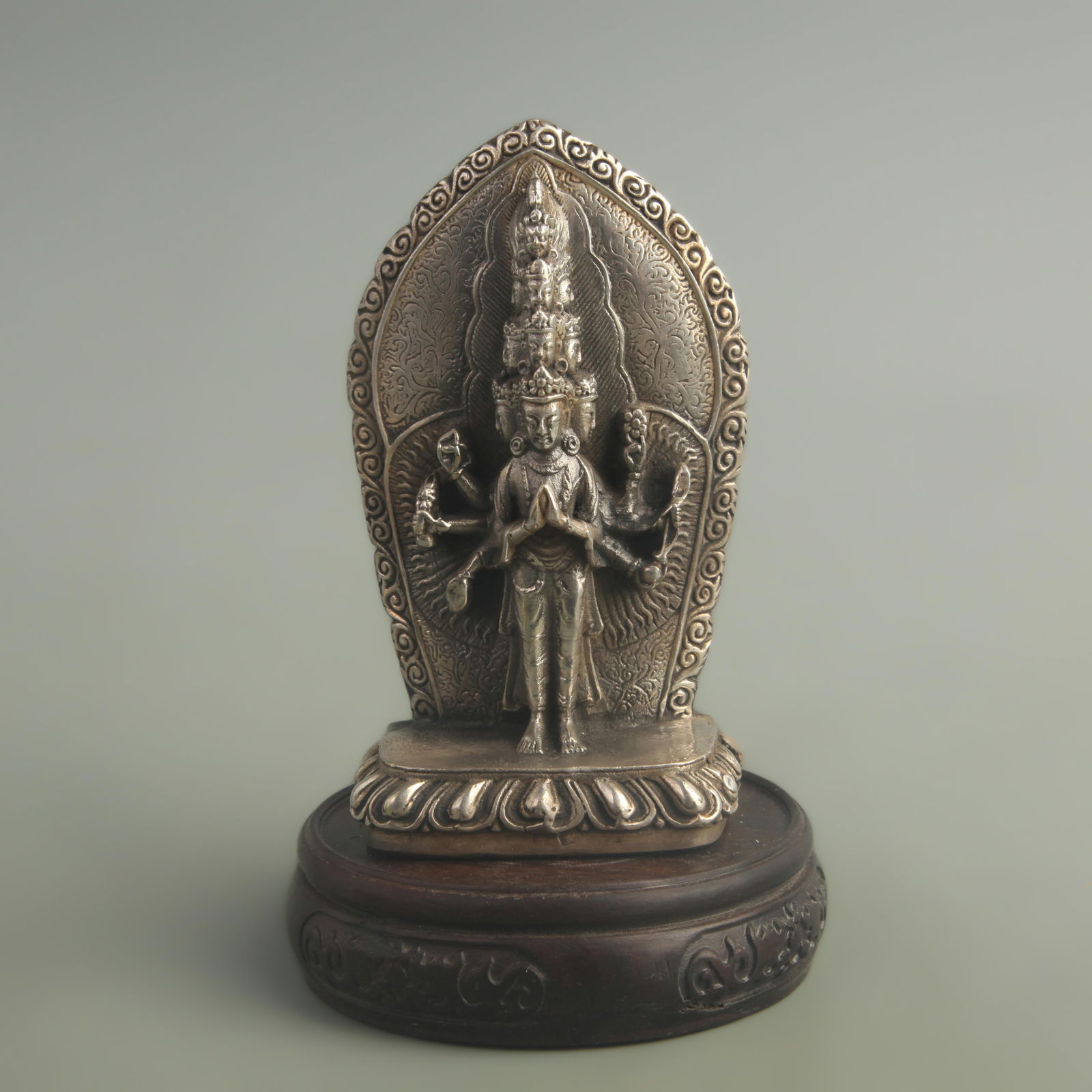 SILVER-GILT BRONZE THOUSAND-ARMED AVALOKITESHVARA (GUANYIN): 20th Century; High: 4.80 inch; Width: 1.80 inch; Long:2.60 inch