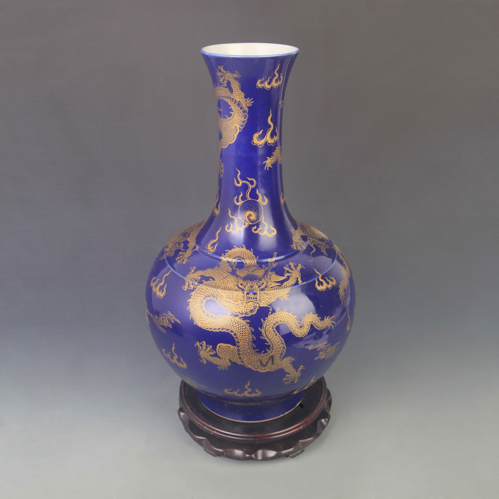 BLUE GLAZE GILT-DECORATED DRAGON TIANQIUPING VASE: Qing Dynasty Kangxi Period; High: 16.5 inch; Diameter: 9.00 inch