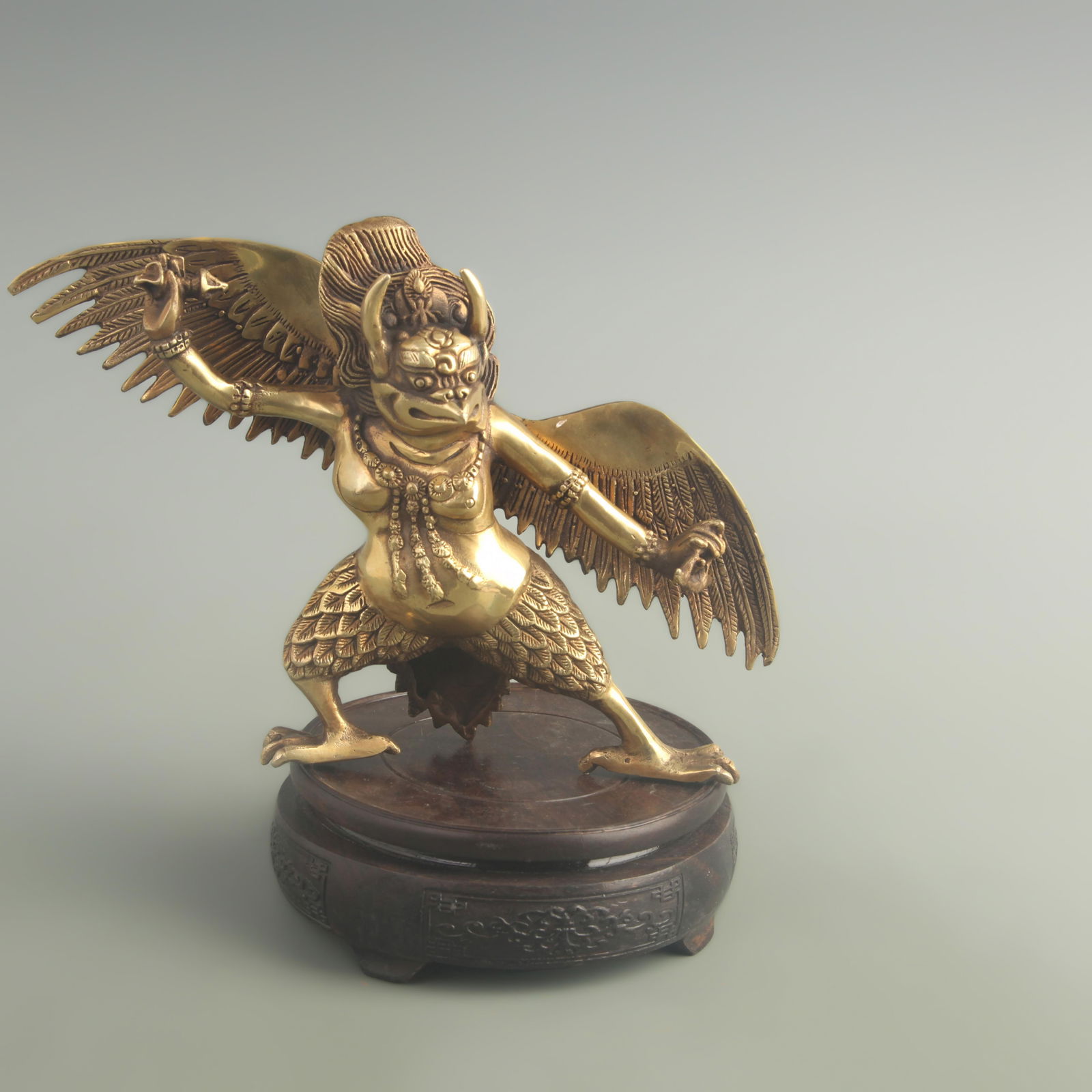 A FINELY MADE BRONZE GARU?A STATUE: 20th Century; High: 7.00 inch; Width: 1.80 inch; Long: 9.80 inch;