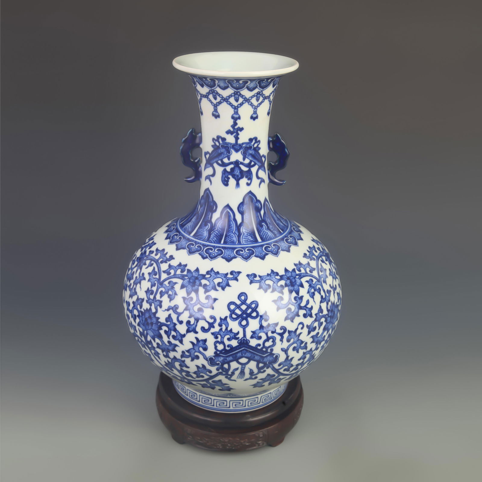 BLUE-AND-WHITE INTERTWINED LOTUS DOUBLE-HANDLED LONG-NECK VASE: Qing Dynasty Qian Long Period; High: 13.8 inch; Diameter: 8.00 inch