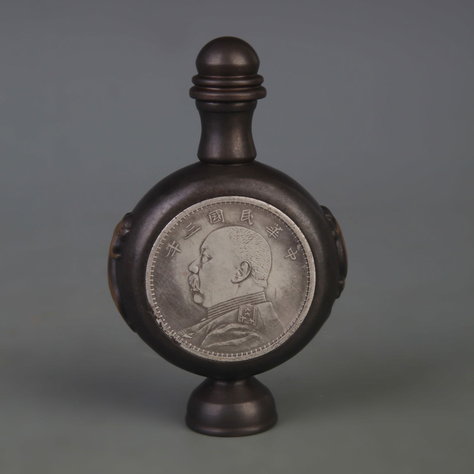 A CHINESE COIN MADE BRONZE SNUFF BOTTLE: Republic Period; Width: 2.6 inch; High: 4.2 inch