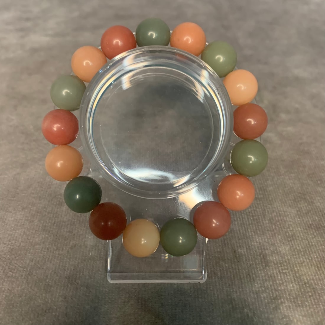 A FINE COLOR PUTI SEED MADE BRACELETS: Modern; Diameter: 2 inch; Each Bead Diameter: 0.4 inch