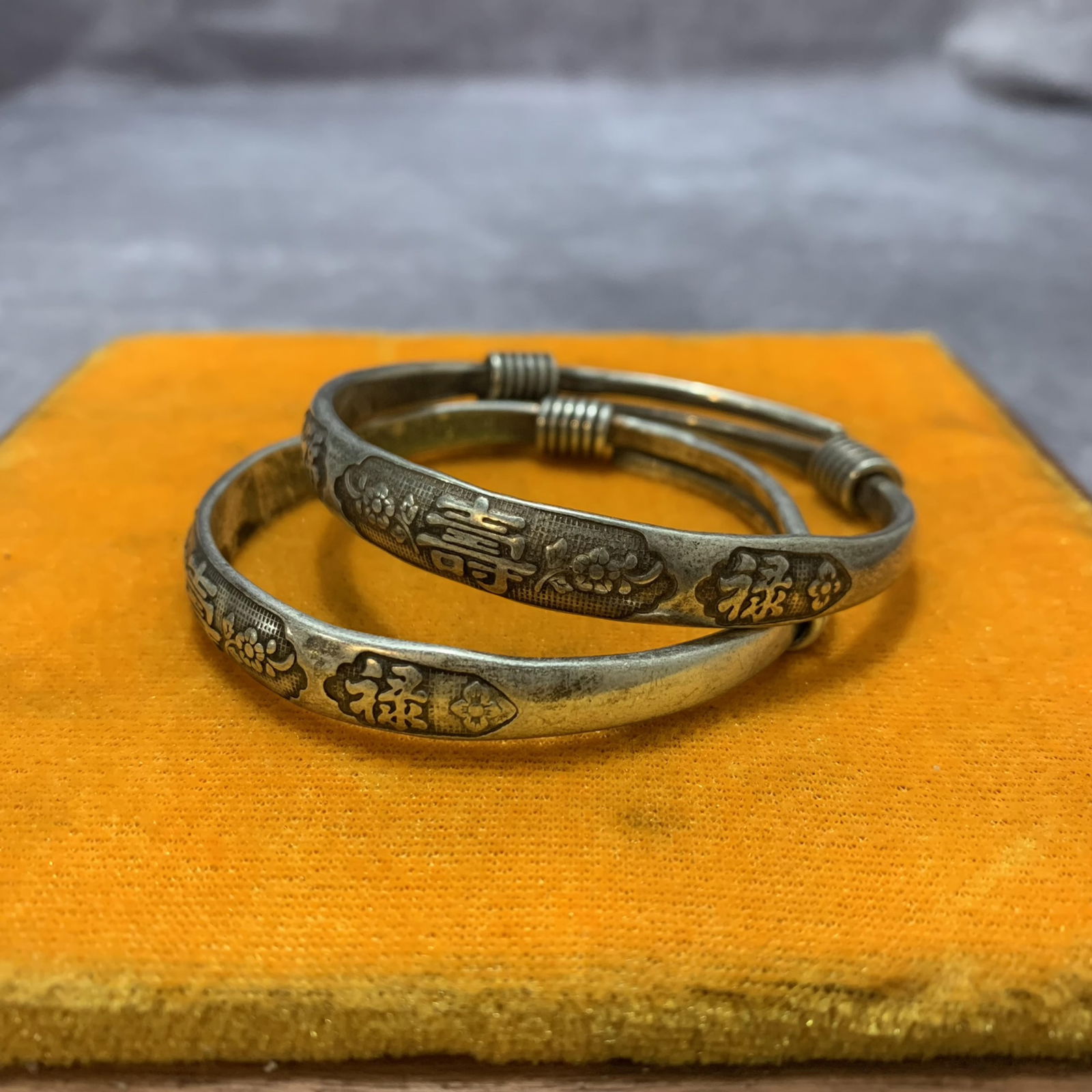 PAIR OF WHITE BRONZE SILVER GILT BANGLES: Pepublic Period; Diameter: 2.6 inch