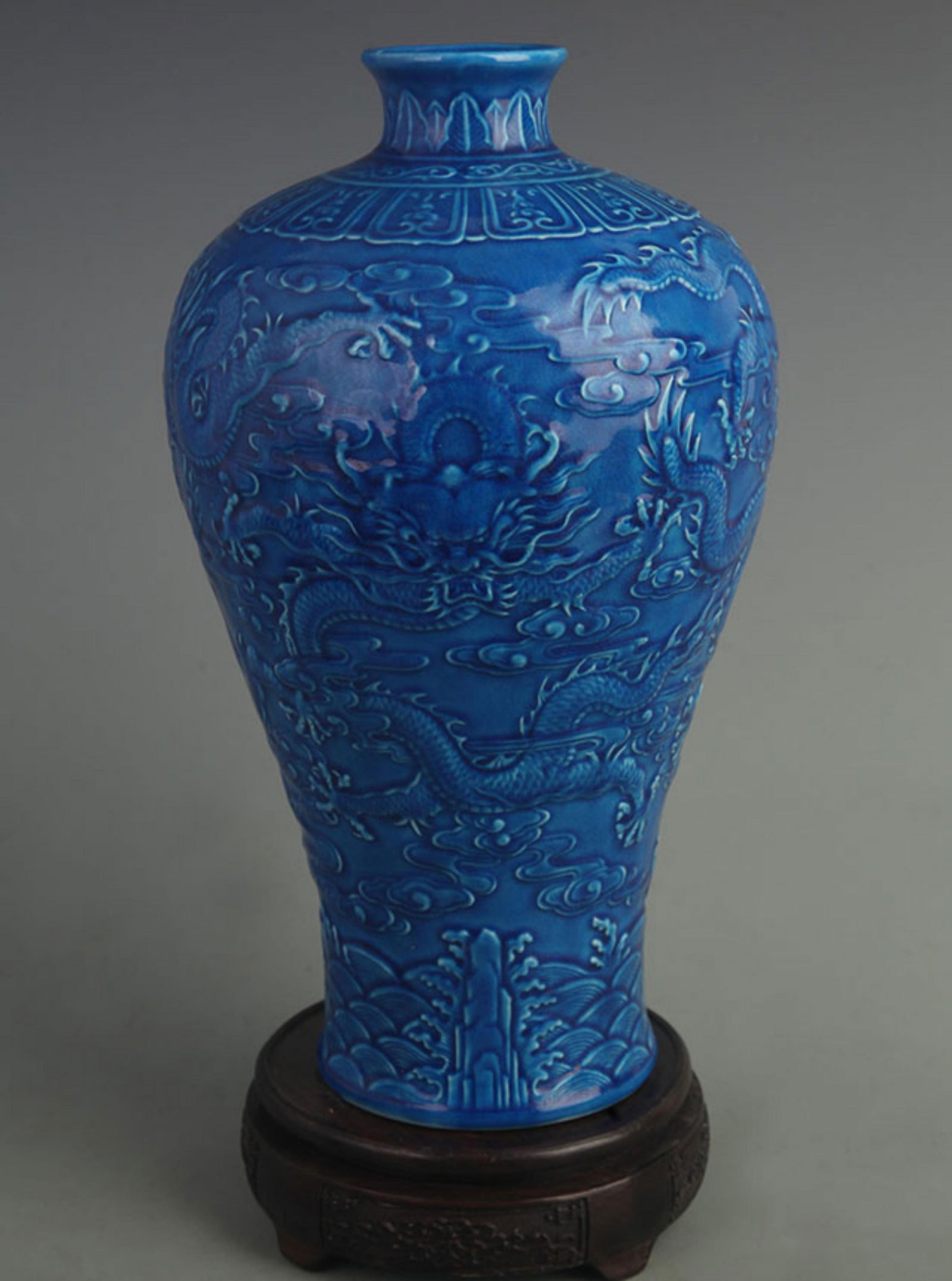 BLUE GLAZE DRAGON PATTERN CARVED MEI PING PORCELAIN VASE: Qing Dynasty Qian Long Period; High: 11.2 inch; Diameter: 4.00 inch