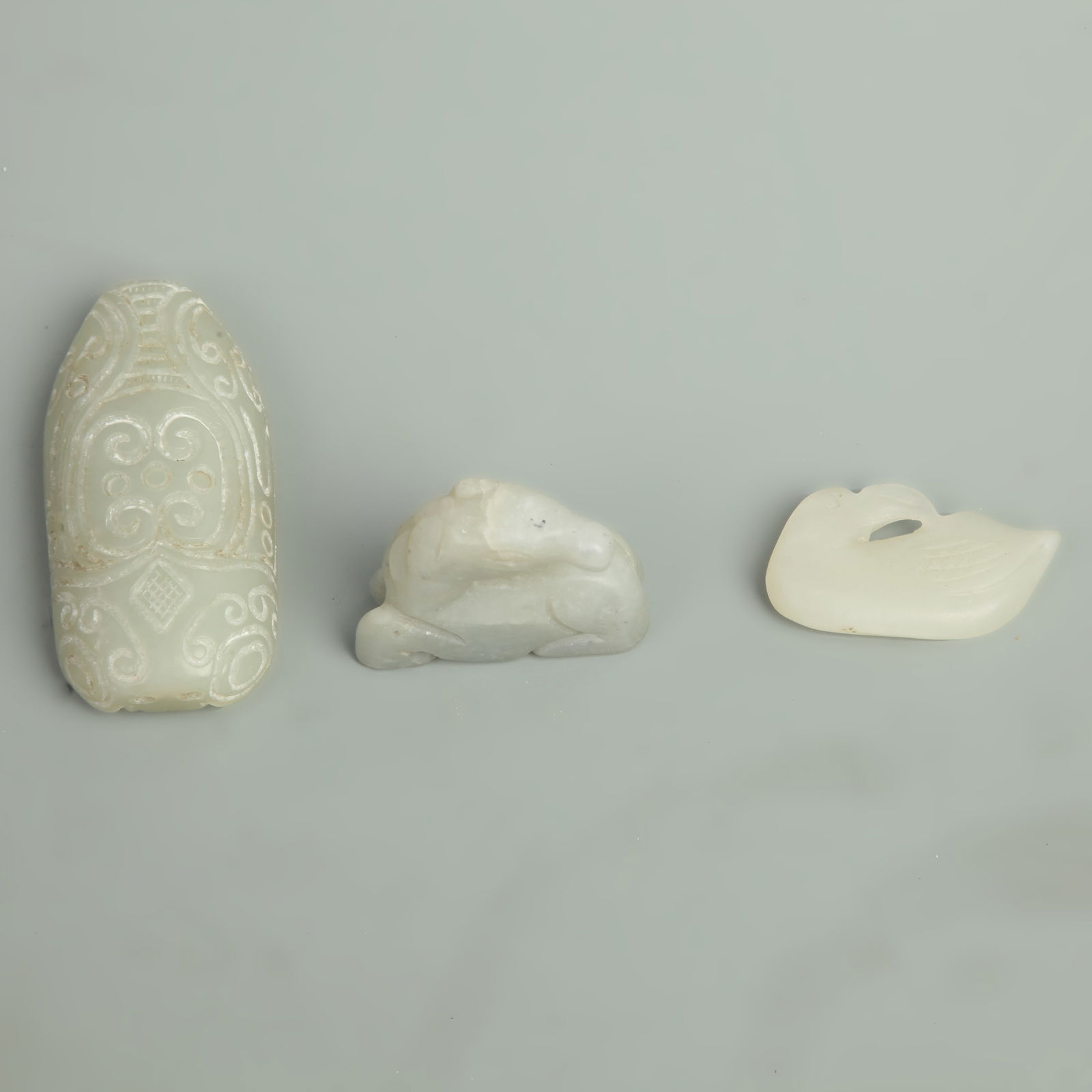 GROUP OF THREE JADE PENDANT: Qing Dynasty; Various Size