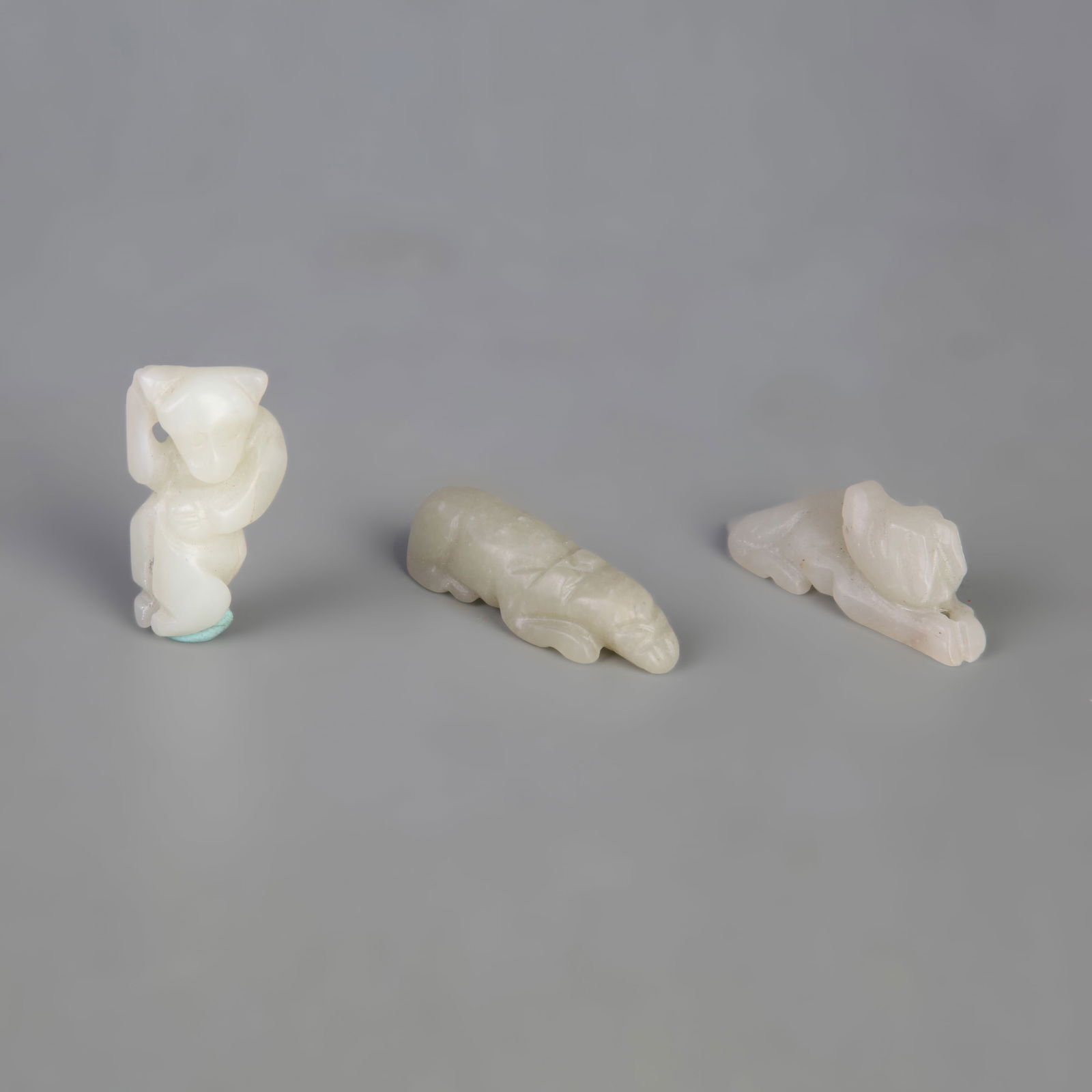 GROUP OF HETIAN JADE PENDANTS (THREE PIECES): Width: 0.6-0.8 inch; Long:1.4-1.9 inch