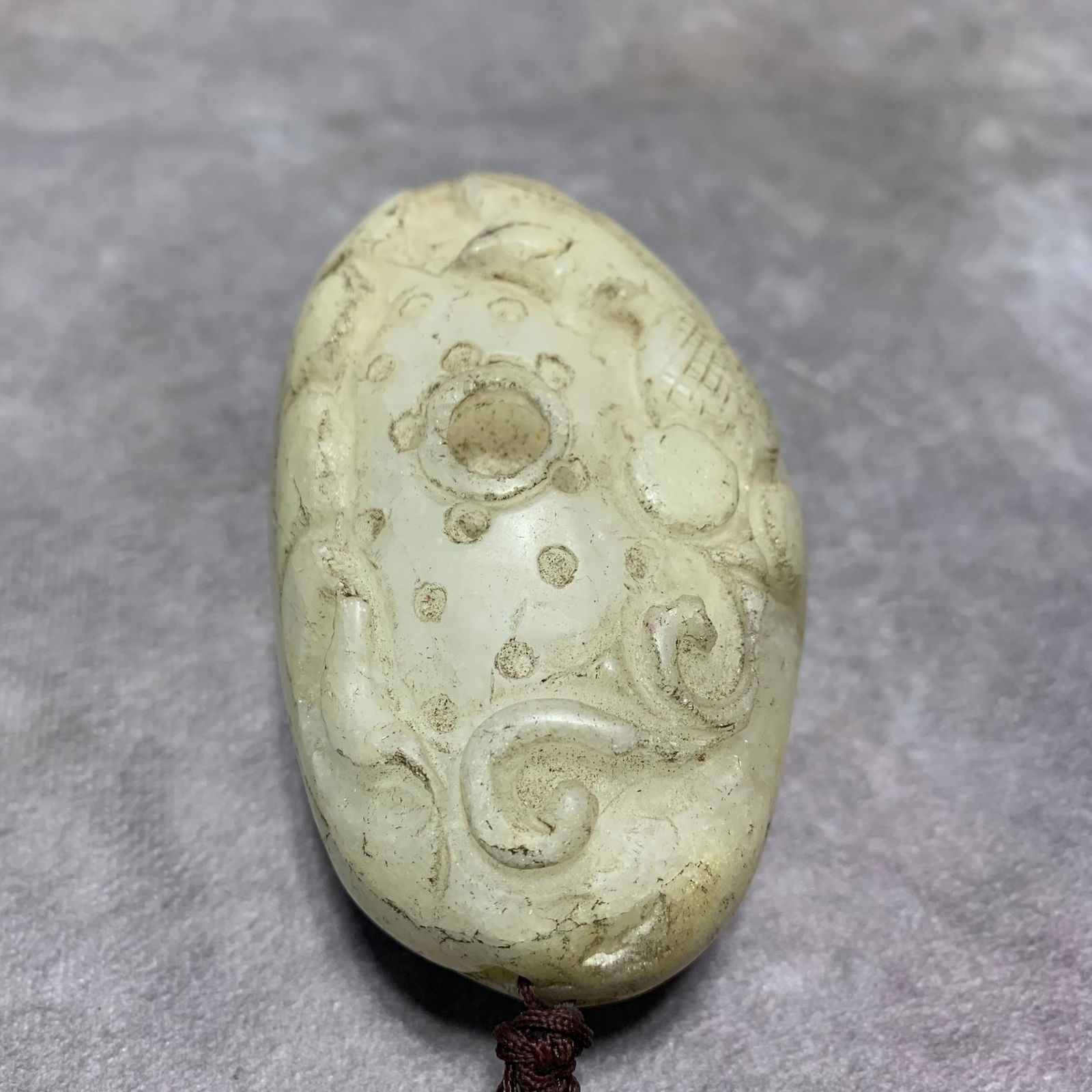 MODERN WHITE JADE HAND PIECE WITH FISH DESIGN: Modern; Long: 3.7 inch; Width: 2.2 inch; High: 2 inch;