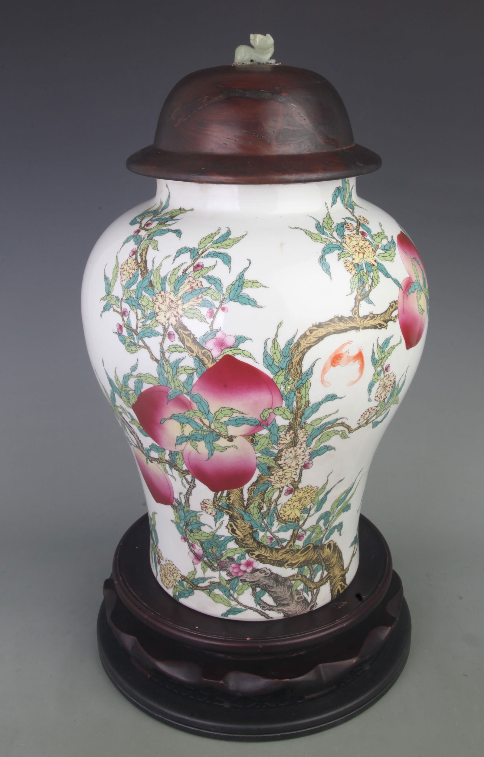 RARE FAMILLE ROSE FU AND SHOU DESIGN PORCELAIN GENERAL JAR (REDWOOD LID, WHITE JADE KNOB): Qing Dynasty; Diameter: 10.0 inch; High: 18.5 inch