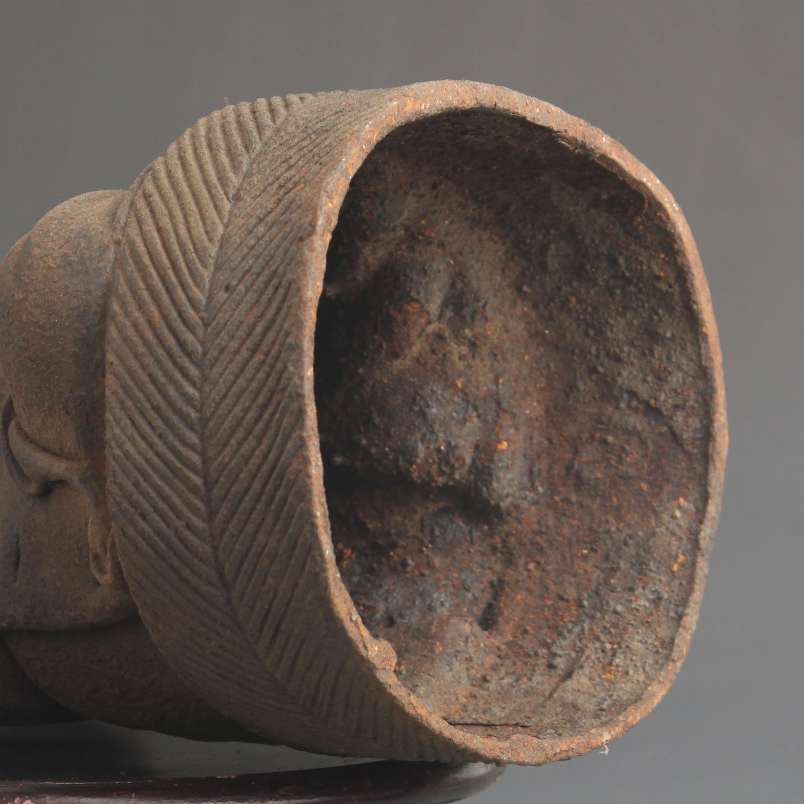 A FINE CAST IRON EAR-PICKING ARHAT - 5