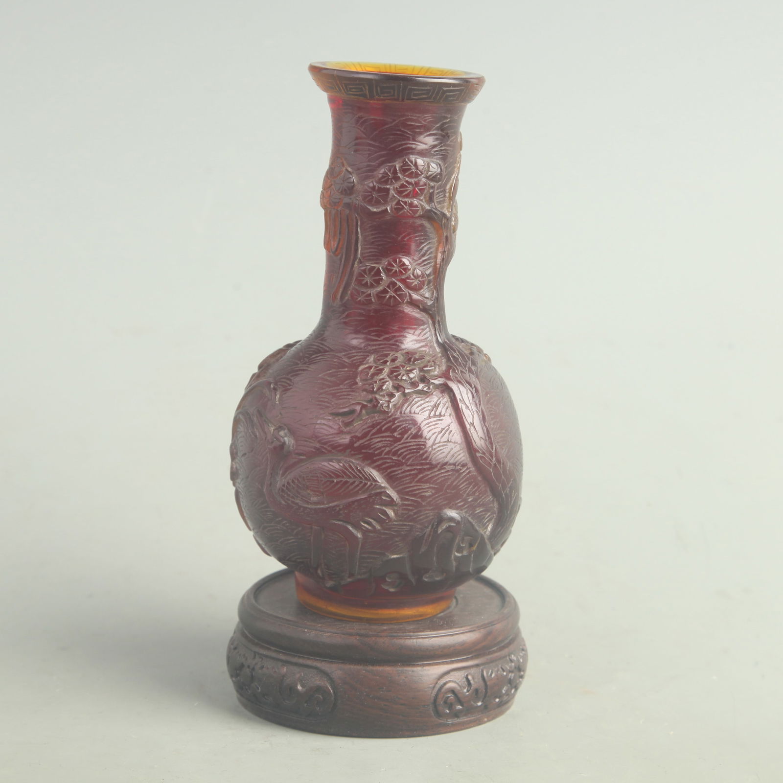 PURPLE GLASS “LONGEVITY WITH PINE AND CRANE?? CLUB-SHAPED VASE: Qing Dynasty; High: 5.8 inch; Diameter: 1.70 inch;