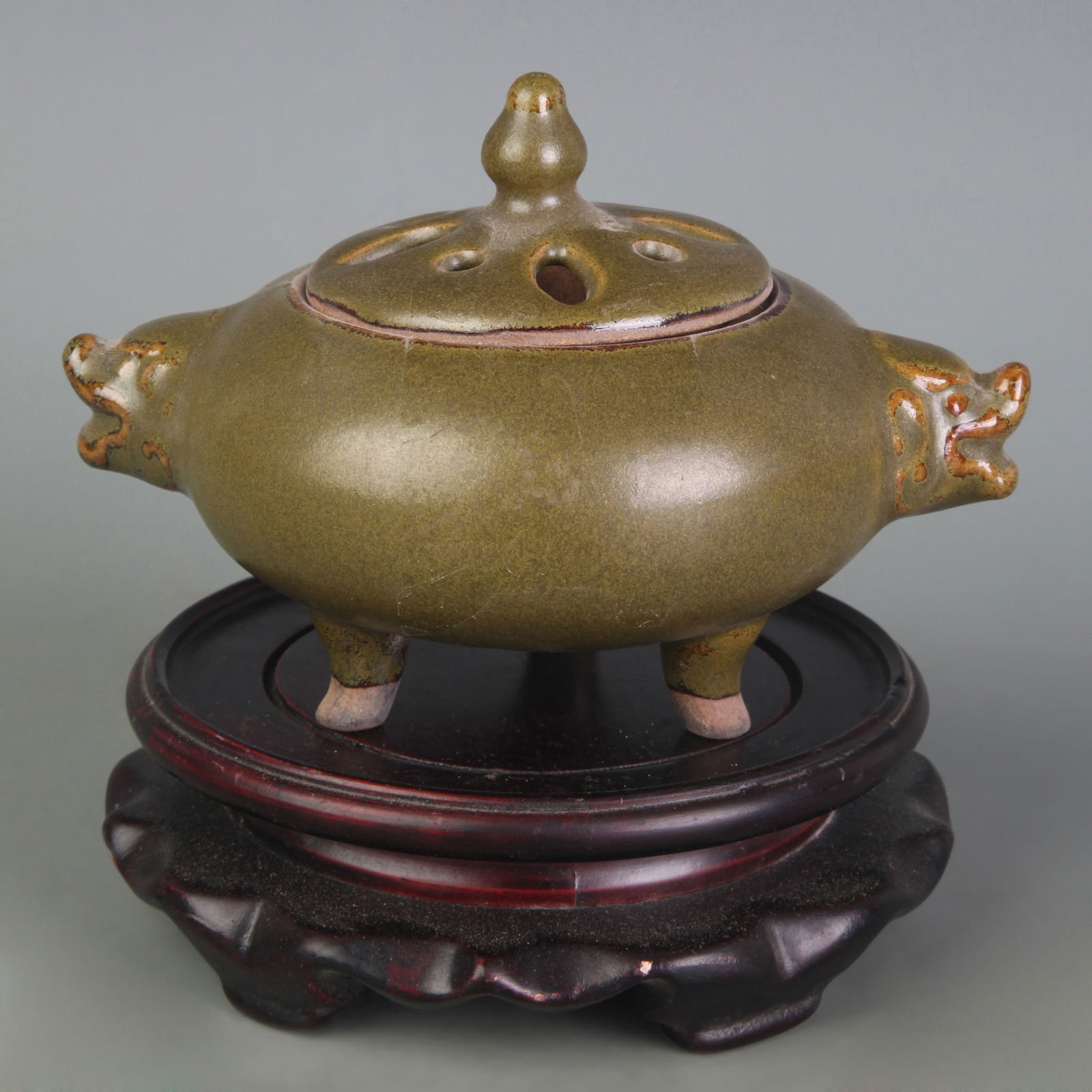 TEA COLOR GLAZE TRIPOD INCENSE BURNER WITH TWIN BEAST-HEAD HANDLES: Qing Dynasty; Width: 5.5 inch; High: 3.6 inch