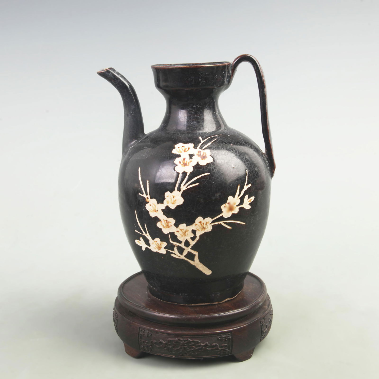 A FINE BLACK COLOR GLAZED PLUM BLOSSOM PATTERN PORCELAIN EWER: Tang Dynasty Style; High: 7.5 inch; Diameter: 3.2 inch;