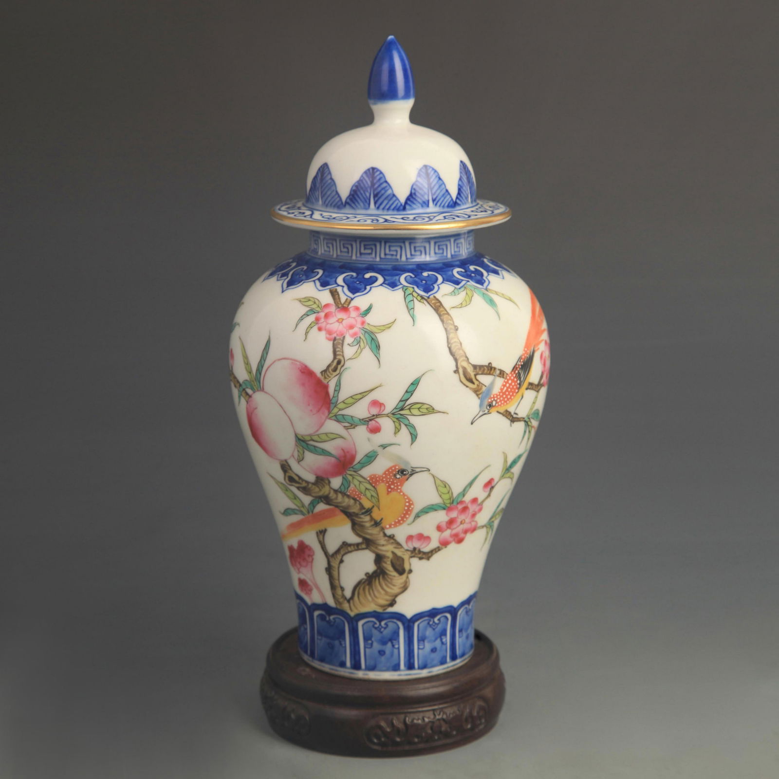 A FINE ENAMEL COLOR FLOWER AND BIRD PORCELAIN JAR: Qing Dynasty Qian Long Period; High: 9.80 inch; Diameter: 4.60 inch;
