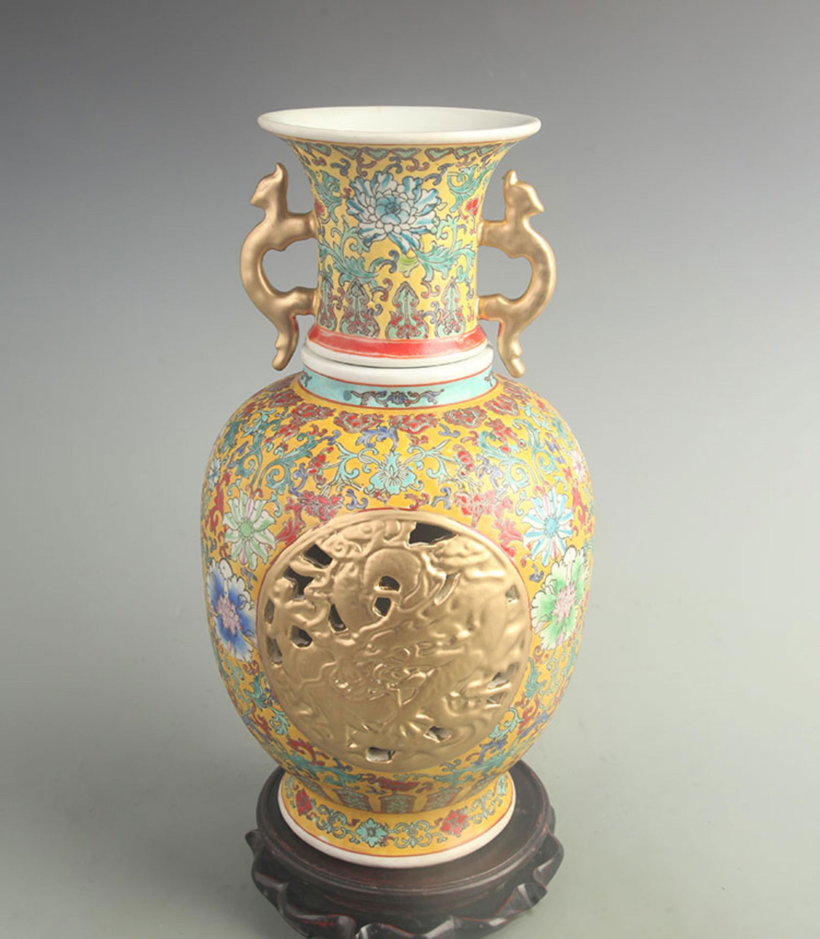YELLOW-GROUND DOUBLE-SIDED CARVED DRAGON AND PHOENIX PORCELAIN VASE: Qing Dynasty Qianlong Period; High: 15.0 inch; Width: 7.50 inch;