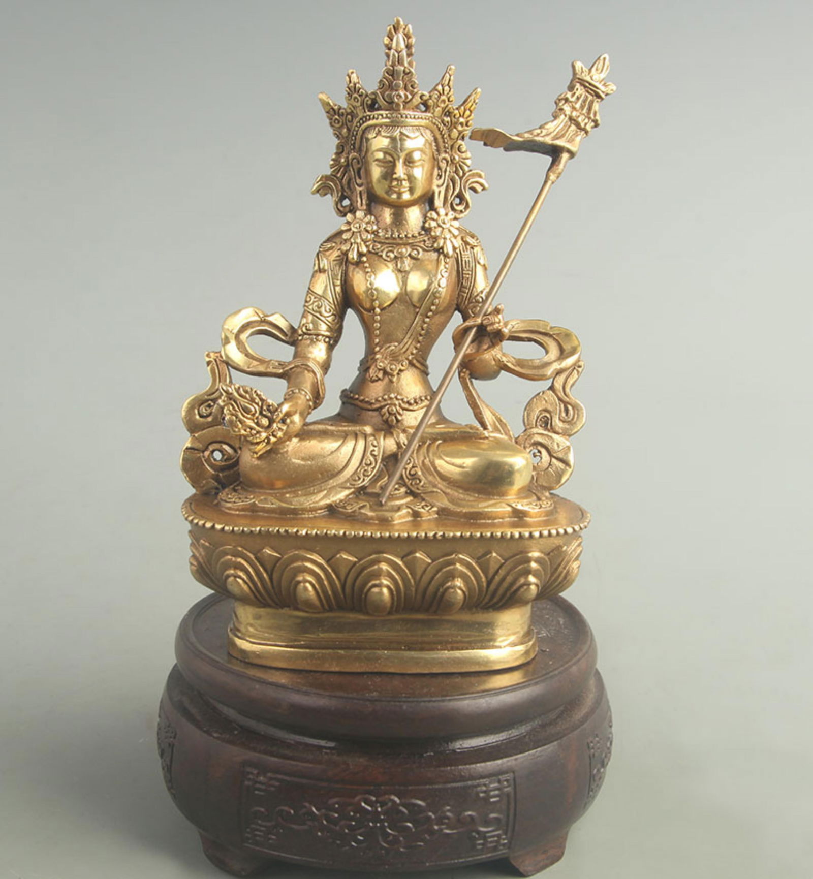 GILT BRONZE PADMASAMBHAVA STATUE (LOTUS-BORN GURU): 20th Century; High: 7.00 inch; Width: 2.20 inch; Long: 4.00 inch;