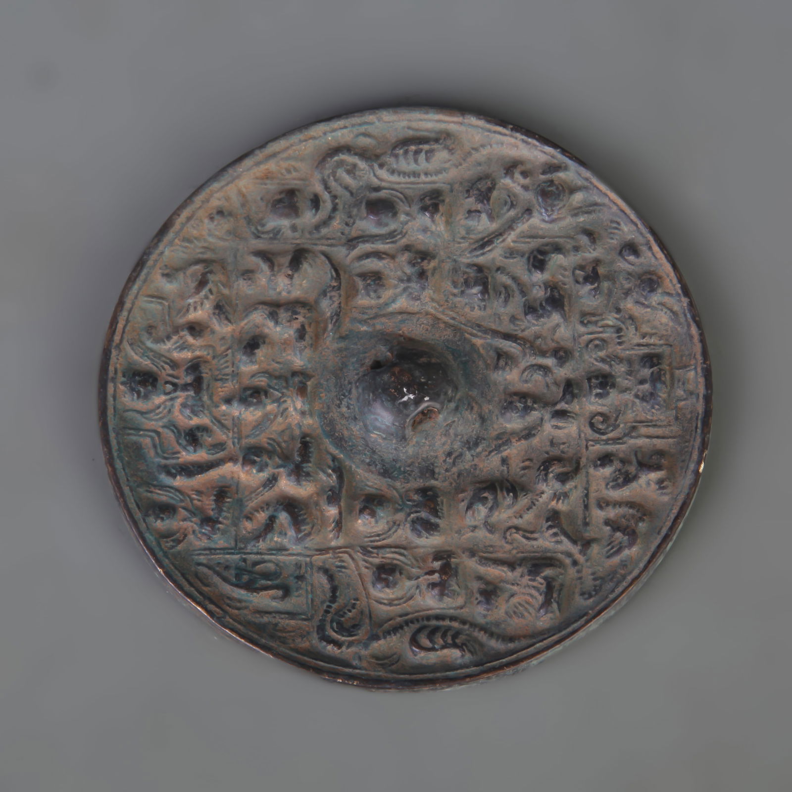 BRONZE MIRROR WITH AUSPICIOUS BEAST MOTIF (1 of 4)