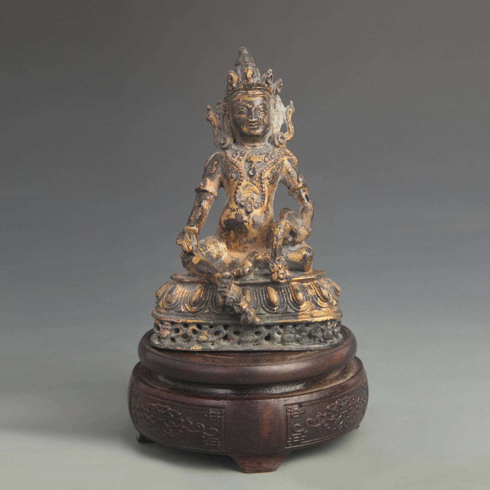 TIBETAN BUDDHIST GILT BRONZE YELLOW WEALTH GOD WITH TREASURE-SPITTING MOUSE: 18th Century; High: 5.75 inch; Width: 3.50 inch;