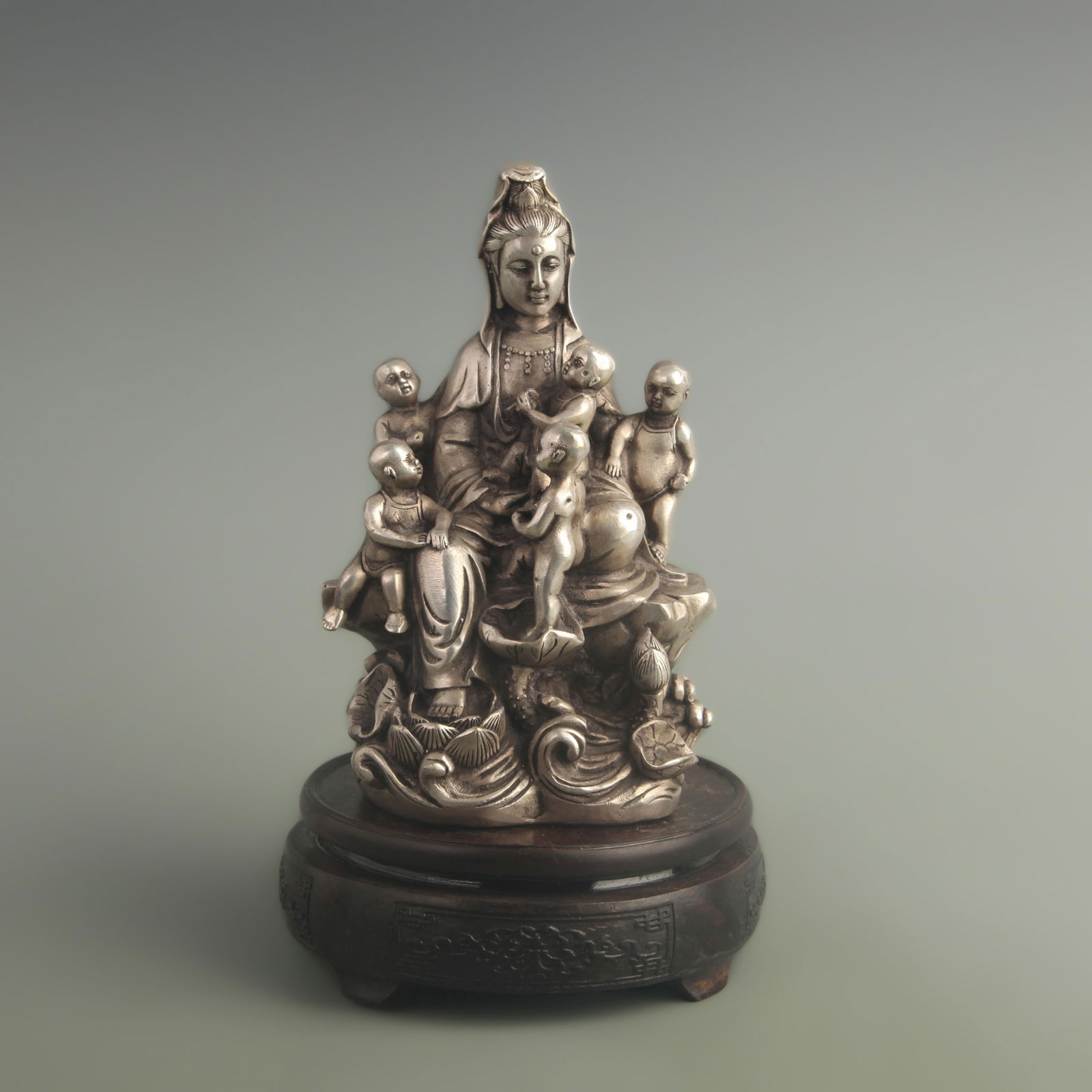 GILT AND SILVER BRONZE FERTILITY GUANYIN STATUE: Qing Dynasty Qian Long Period; High: 7.00 inch; Width: 3.20 inch; Long: 3.90 inch;