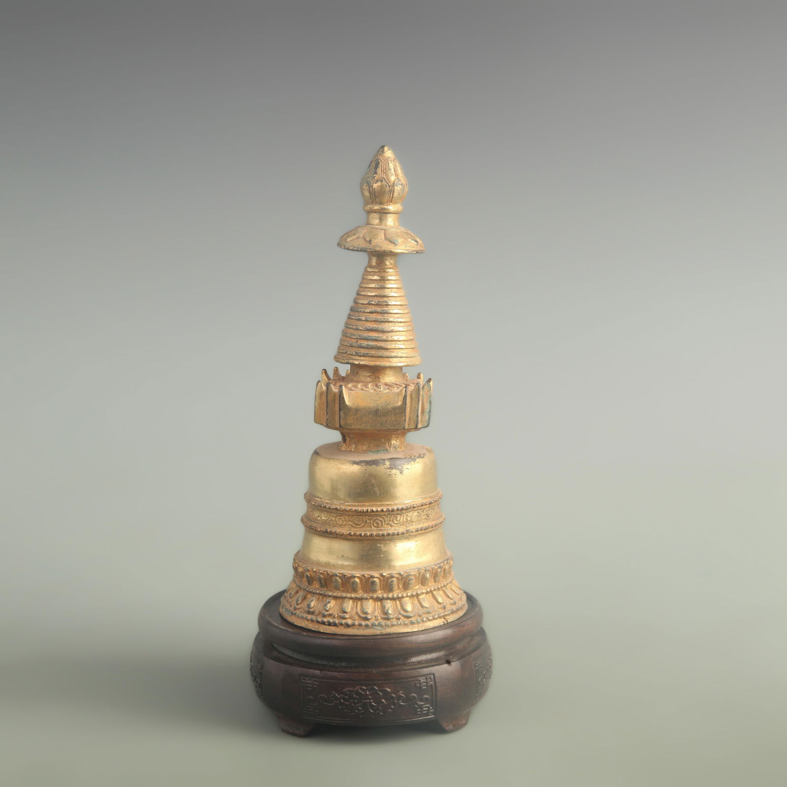 A FINE GILT BRONZE PAGODA: 19th Century; High: 9.00 inch; Diameter: 3.50 inch;