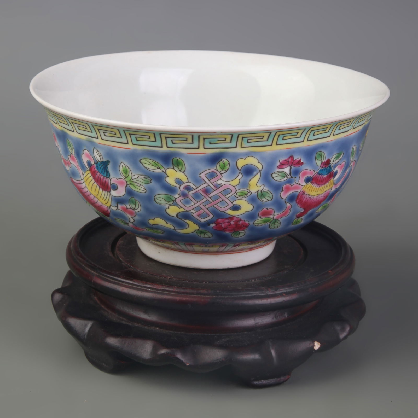 FAMILLE-ROSE BLUE-GROUND EIGHT AUSPICIOUS SYMBOLS BOWL: Qing Dynasty Qian Long Period; Diameter: 5.6 inch; High: 2.7 inch