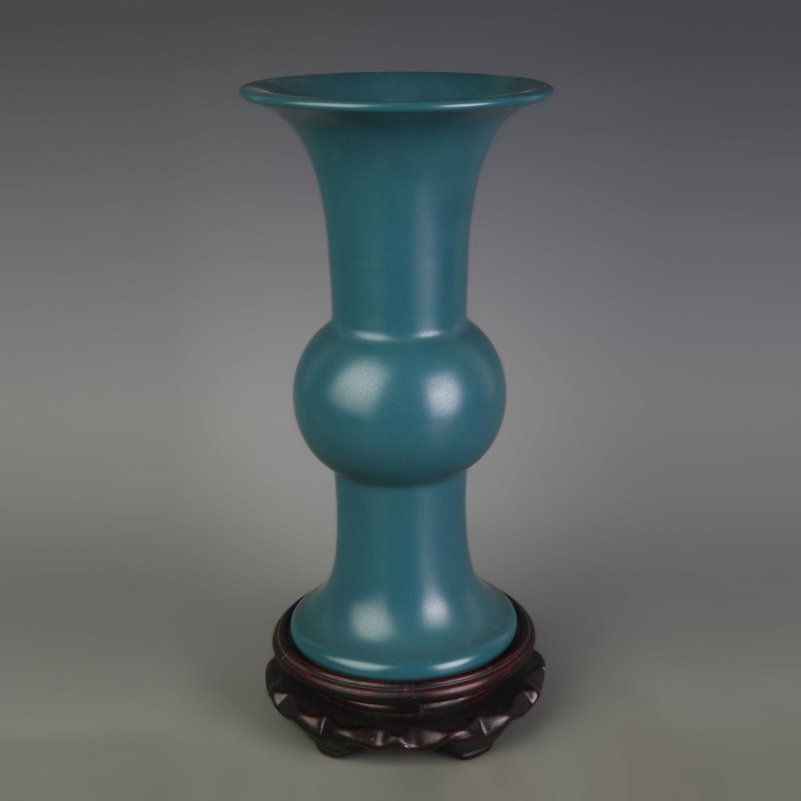 PEACOCK-BLUE–GLAZED PORCELAIN FLOWER VASE: Qing Dynasty; High: 9.9 inch; Diameter: 5.1 inch;