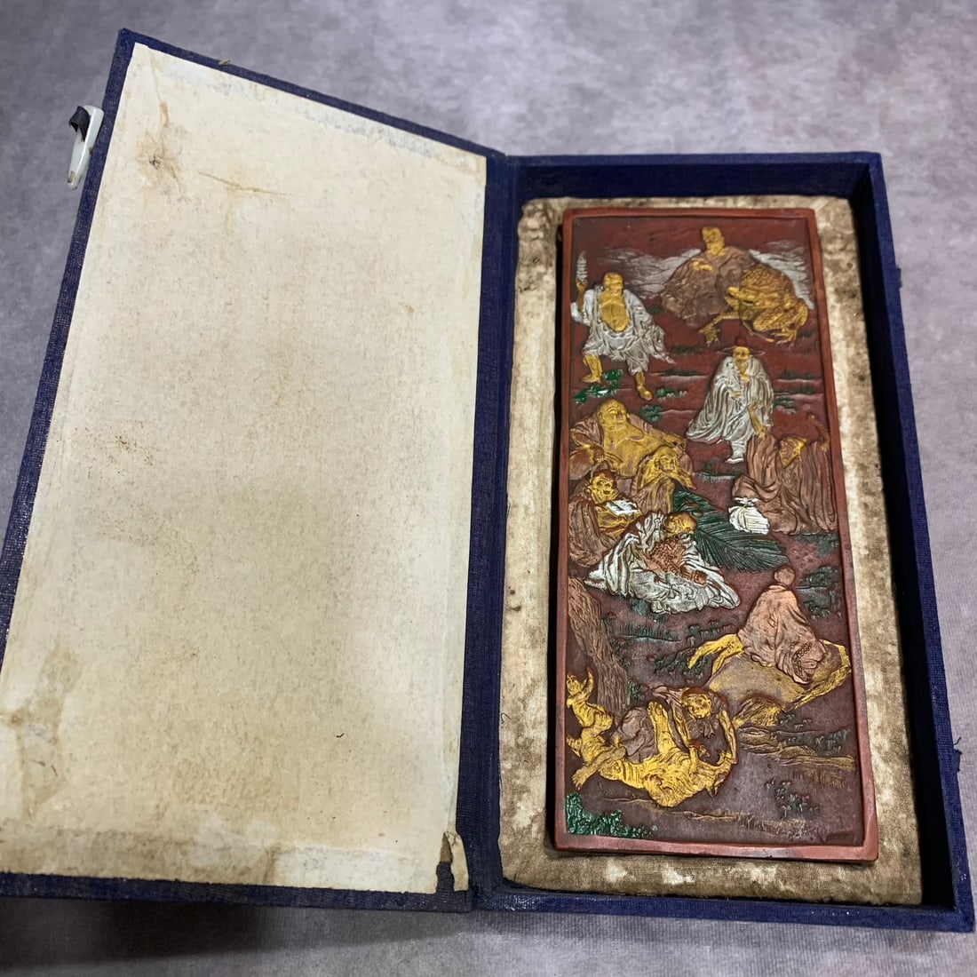 A FINELY CARVED CINNABAR INK WITH BOX: Qing Dynasty; High: 0.8 inch; Width: 3.8 inch; Long: 9.2 inch;