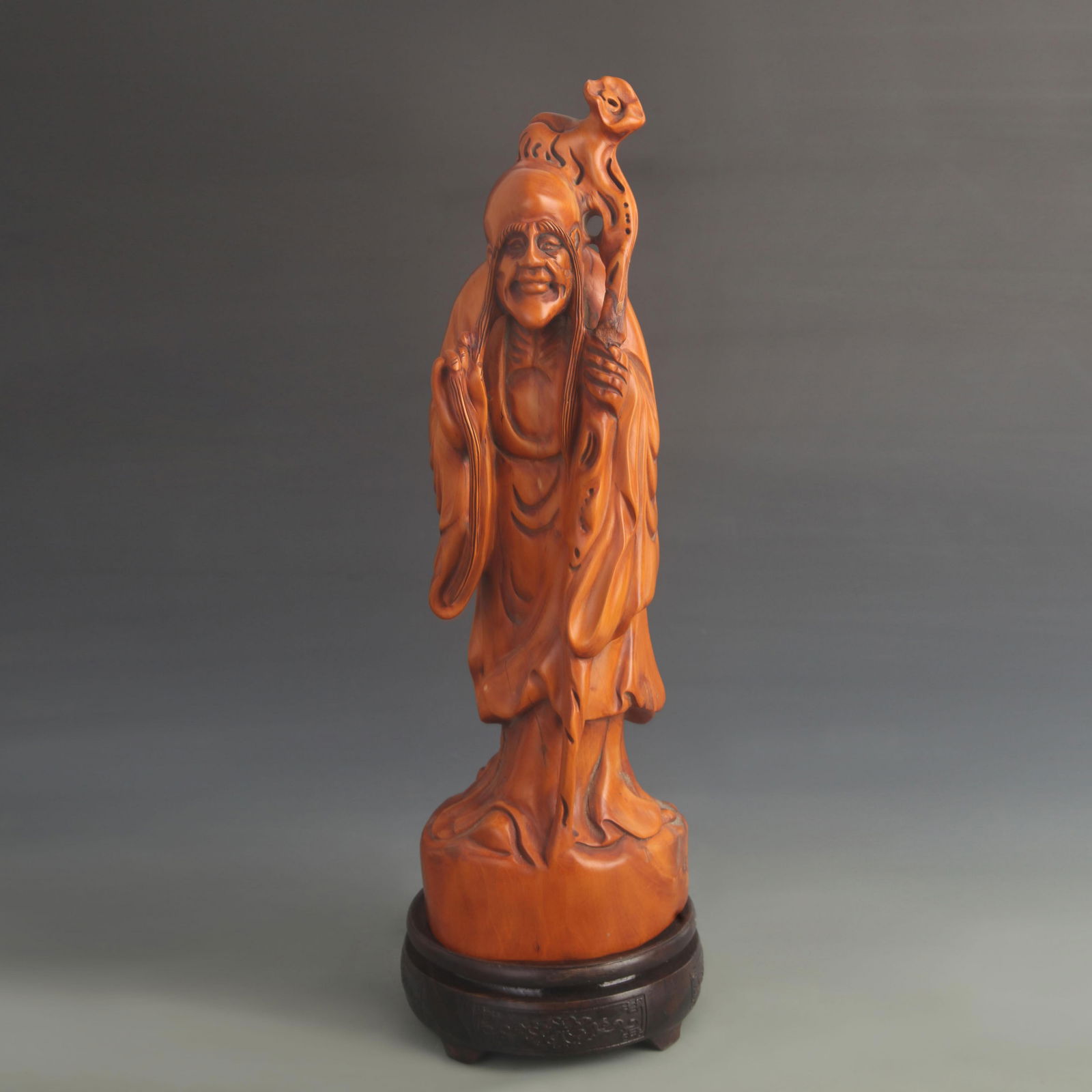 A FINE BOXWOOD CARVED LONGEVITY IMMORTAL FIGURE: 20th Century; High: 15.0 inch; Width: 1.25 inch;