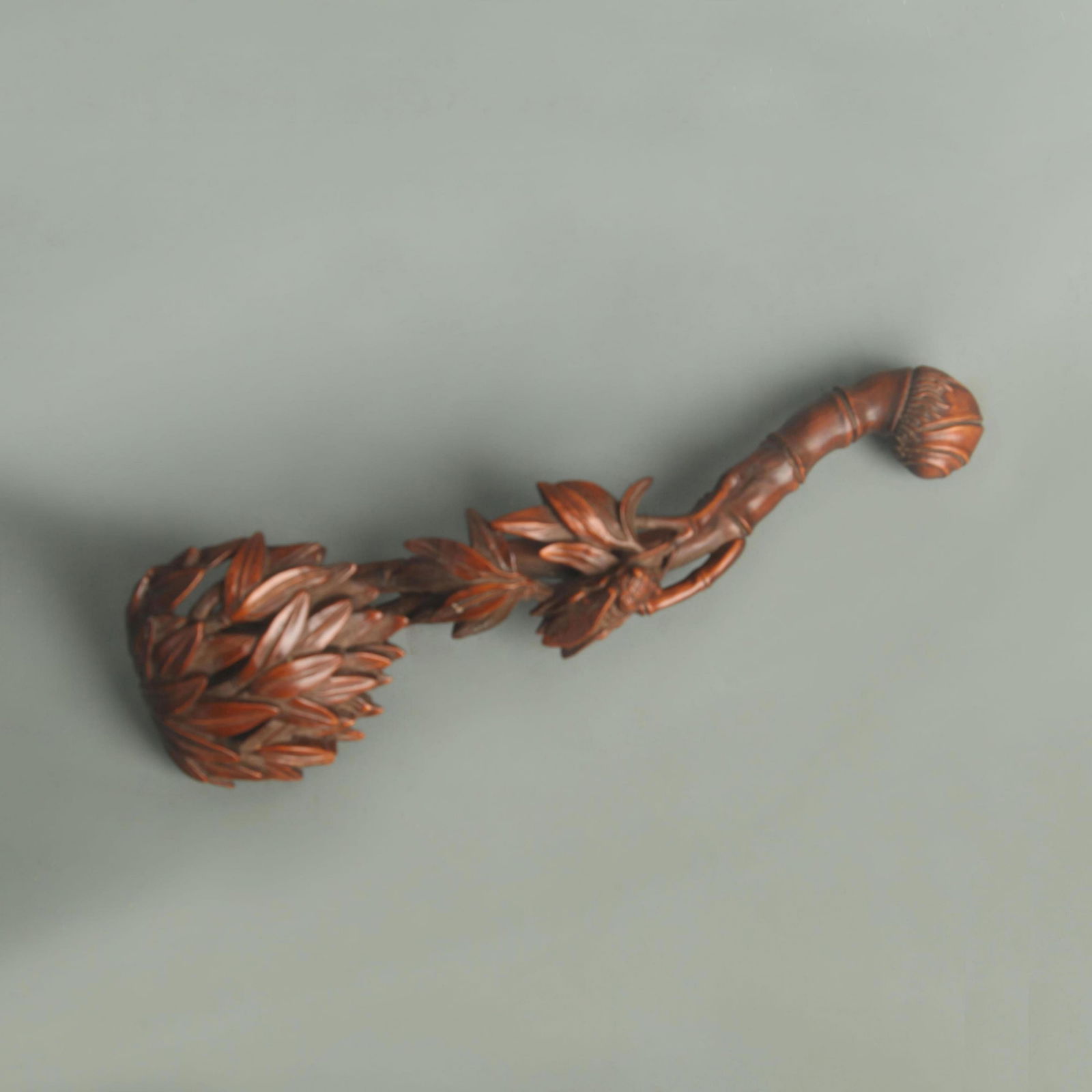 A FINE BOXWOOD CARVING IN FIGURE OF RU YI: 20th Century; Long: 8.00 inch; Width: 2.25 inch;