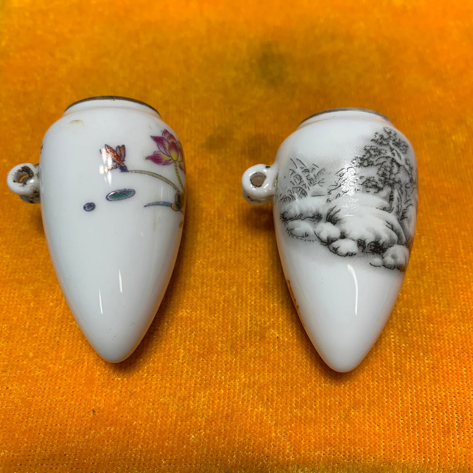 PAIR OF FAMILLE ROSE PORCELAIN BIRD FEEDERS: Republic Period; High: 1.9; 1.9 inch; Diameter: 1.1; 1.1 inch