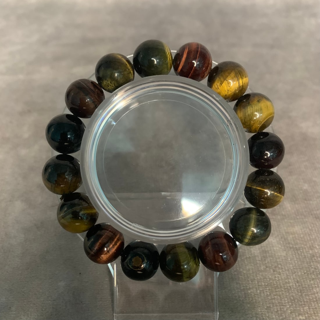 A FINE PETRIFIED WOOD BEAD BRACELET: Modern; Diameter: 2 inch; Each Bead Diameter: 0.5 inch