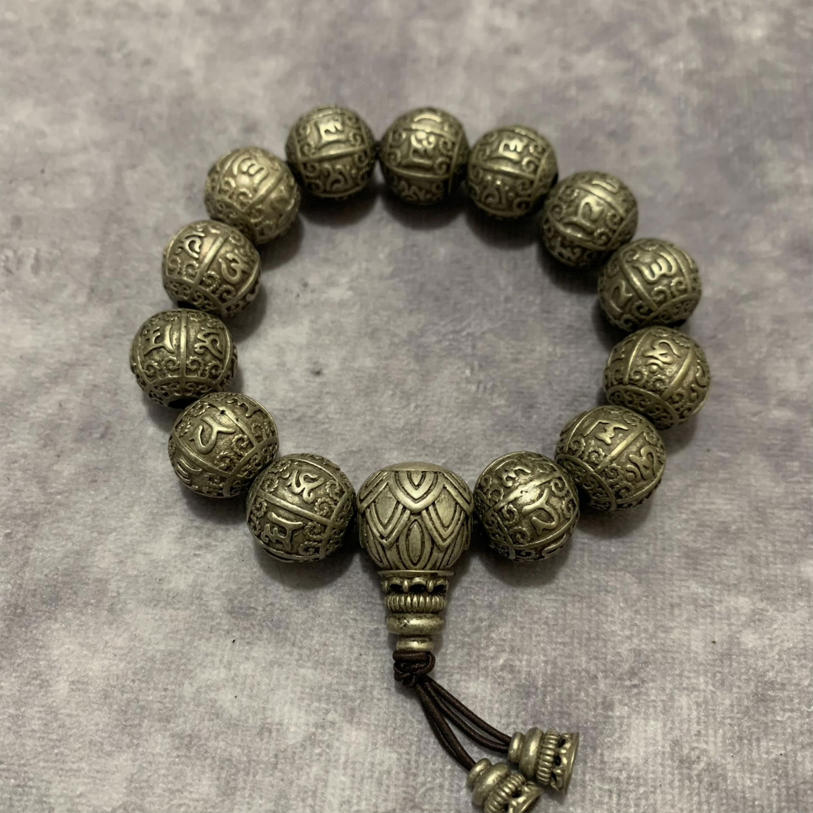 A FINE WHITE BRONZE BRACELETS: 20th Century; Long:2.0 inch; Each Diameter: 0.5 inch;